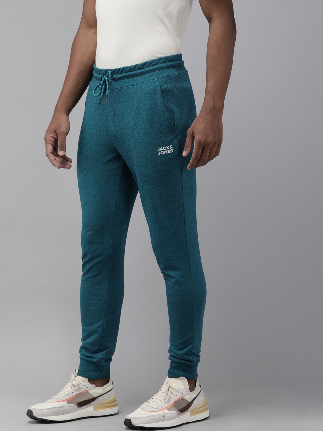 

Jack & Jones Men Teal Blue Solid Joggers