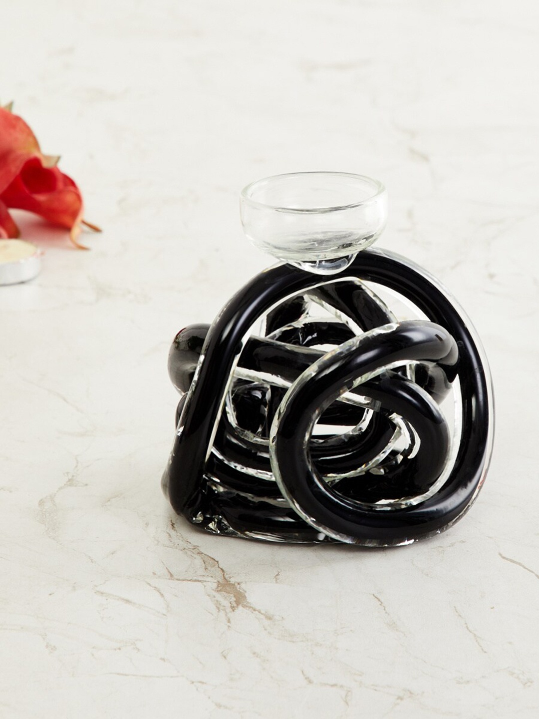 

Home Centre Black & Transparent Solid Twisted Tea Light Holder