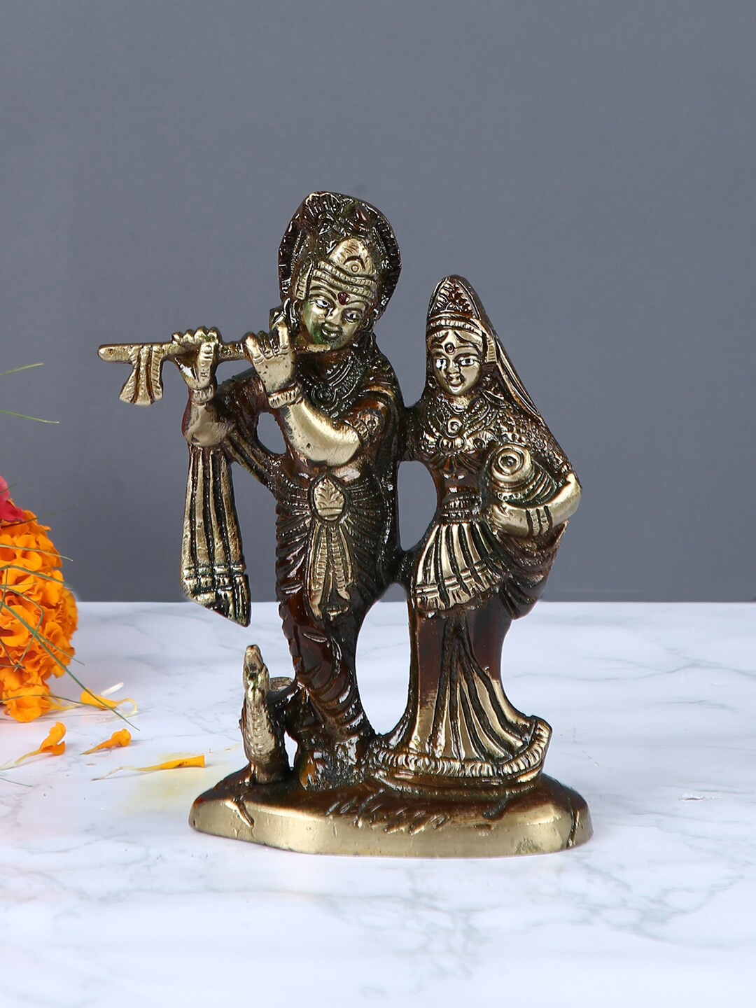 

Aapno Rajasthan Brown & Gold-Toned Brass Radha Krishna Showpiece