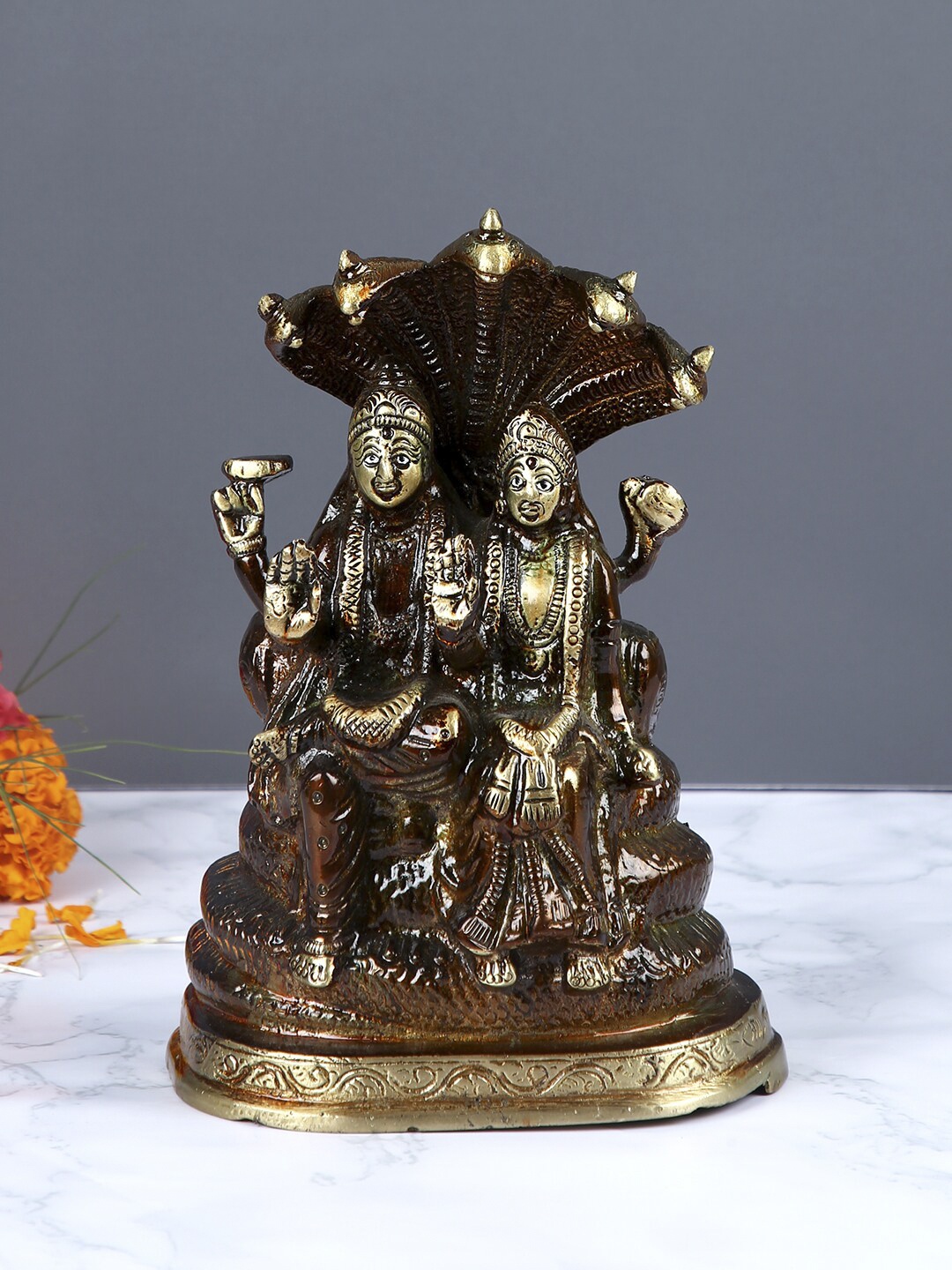 

Aapno Rajasthan Brown & Gold-Toned Brass Antique Vishnu Laxmi Showpiece
