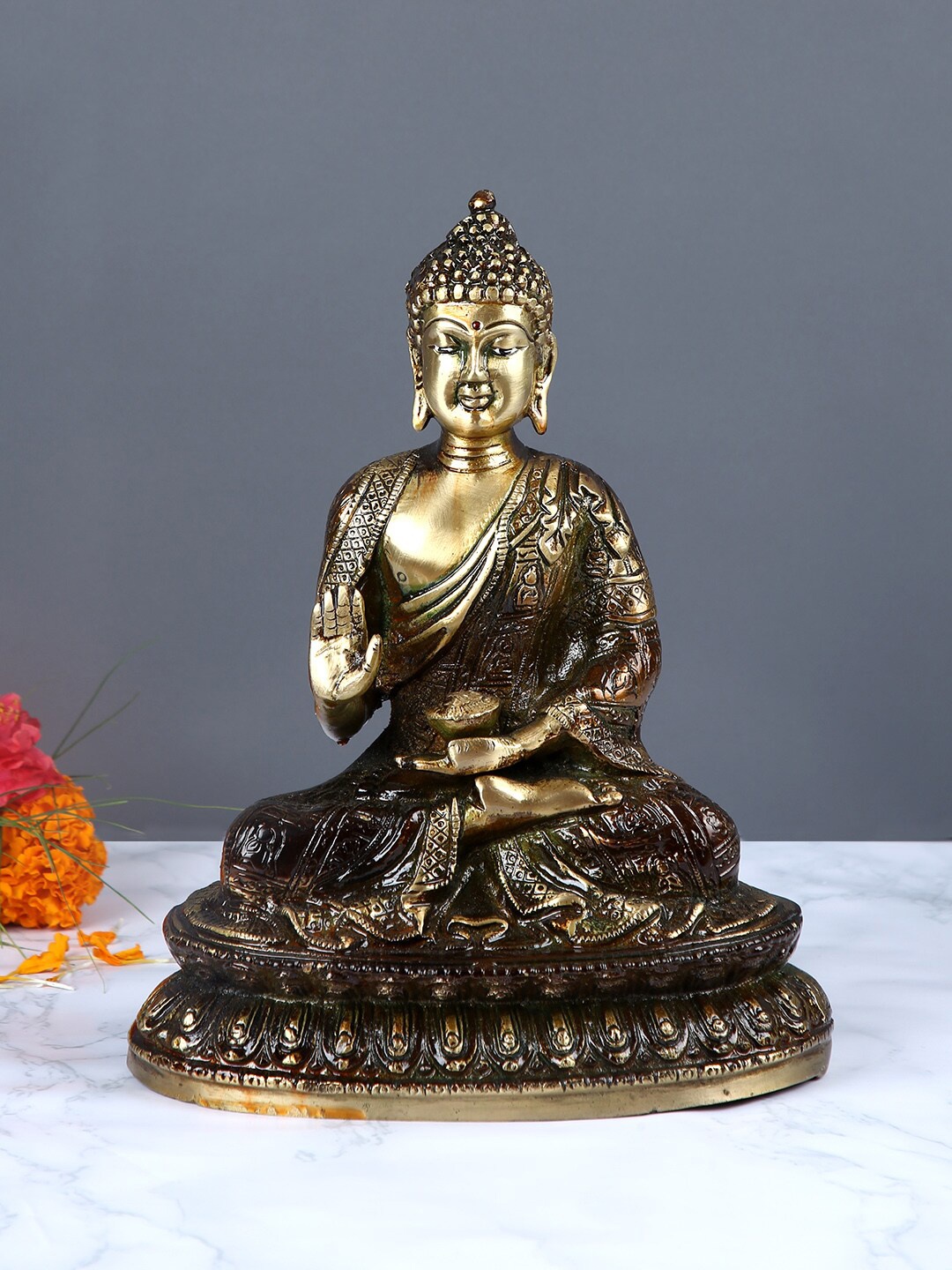 

Aapno Rajasthan Brown & Gold-Toned Meditating Brass Buddha Statue Showpiece