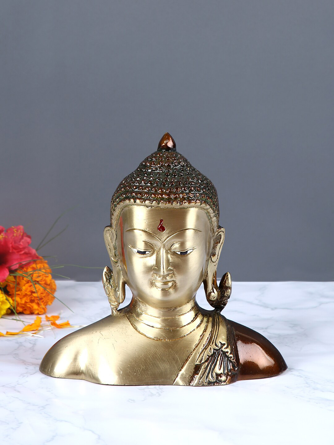 

Aapno Rajasthan Brown & Gold-Toned Buddha Head Brass Statue Showpiece