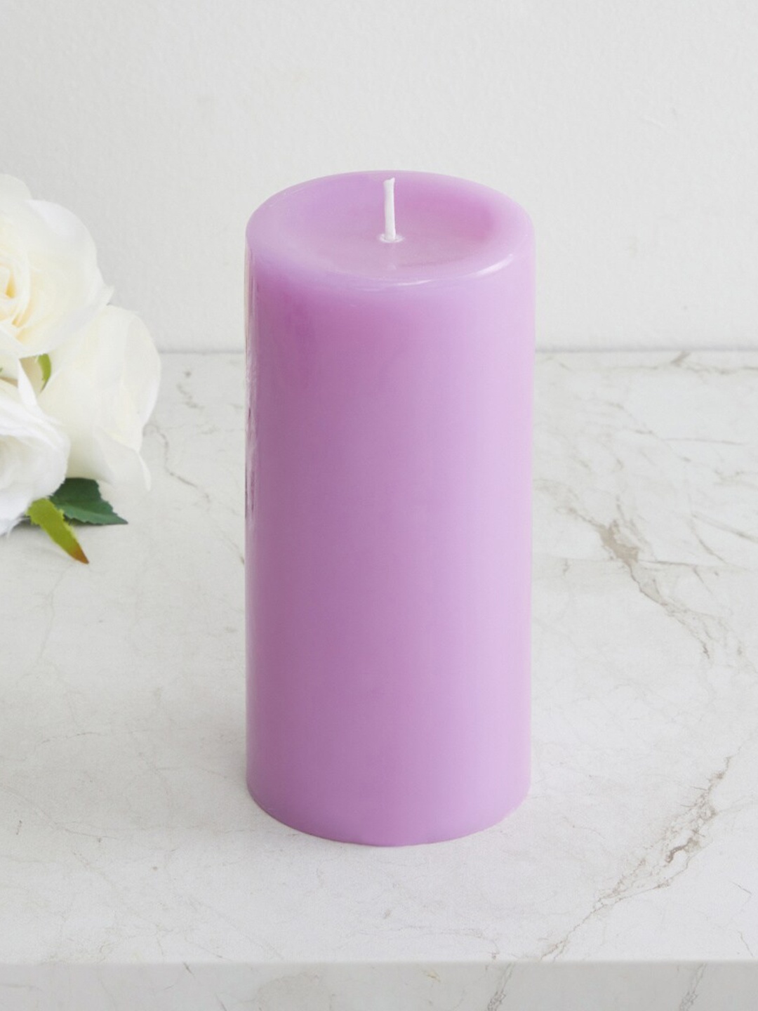 

Home Centre Lavender Soild Jasmine Pillar Candle