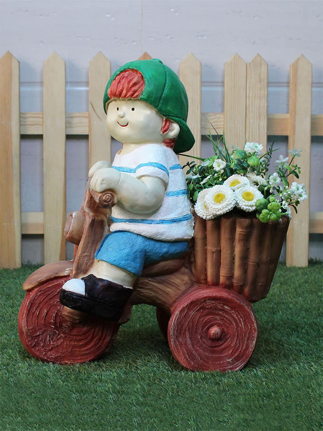 

Wonderland Brown & White Boy on Bike Planter