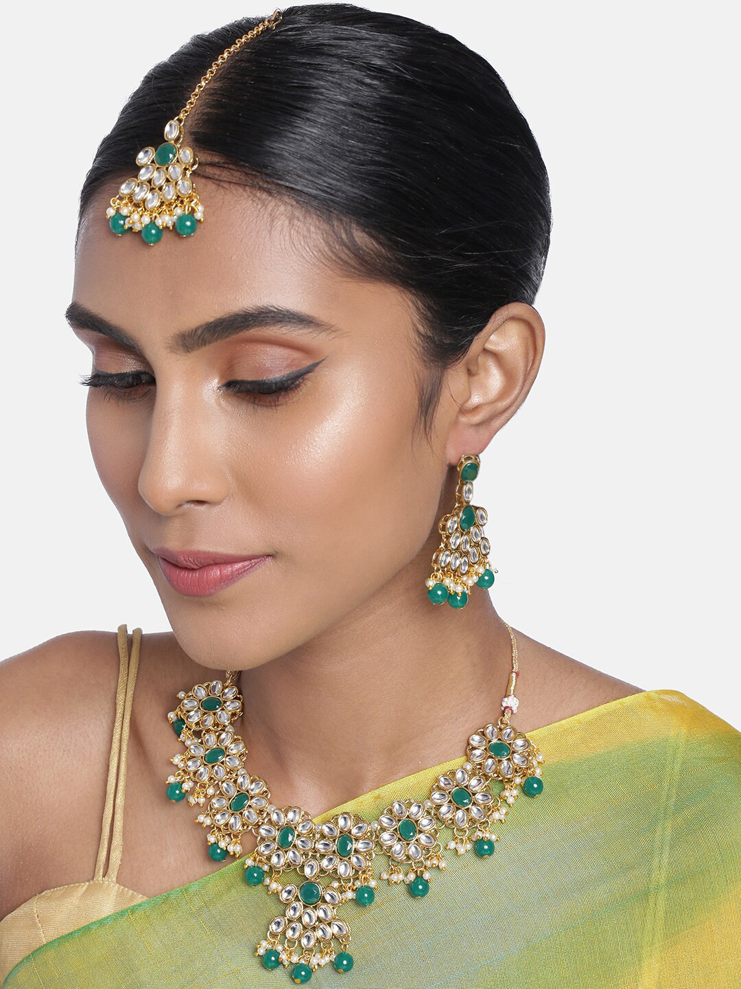 

Peora Green & White Gold Plated Kundan and Pearl Studded Jewellery Set