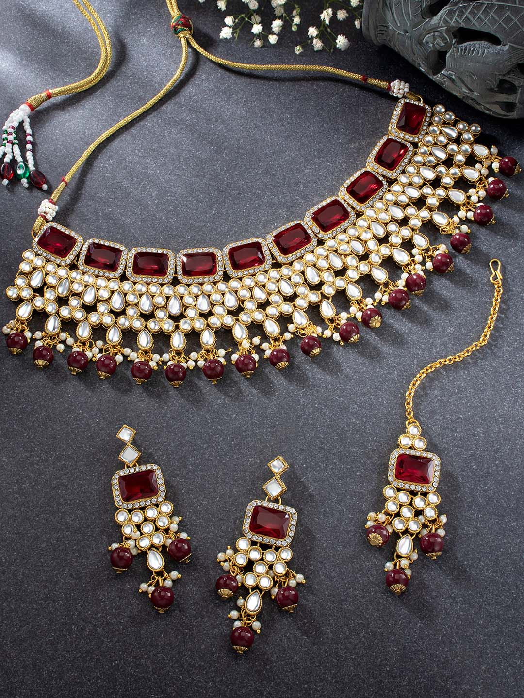 

Peora Maroon Gold Plated Red Kundan Studded Handcrafted Enamelled Jewellery Set