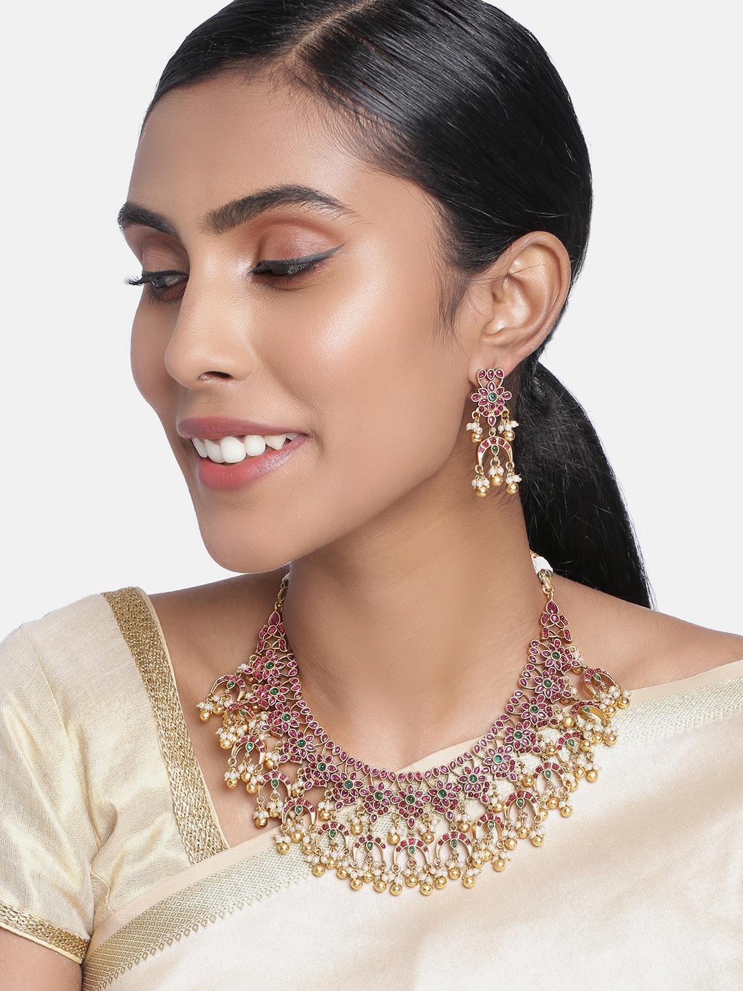 

Peora Gold-Plated Maroon Pearls Studded Temple Jewellery Set