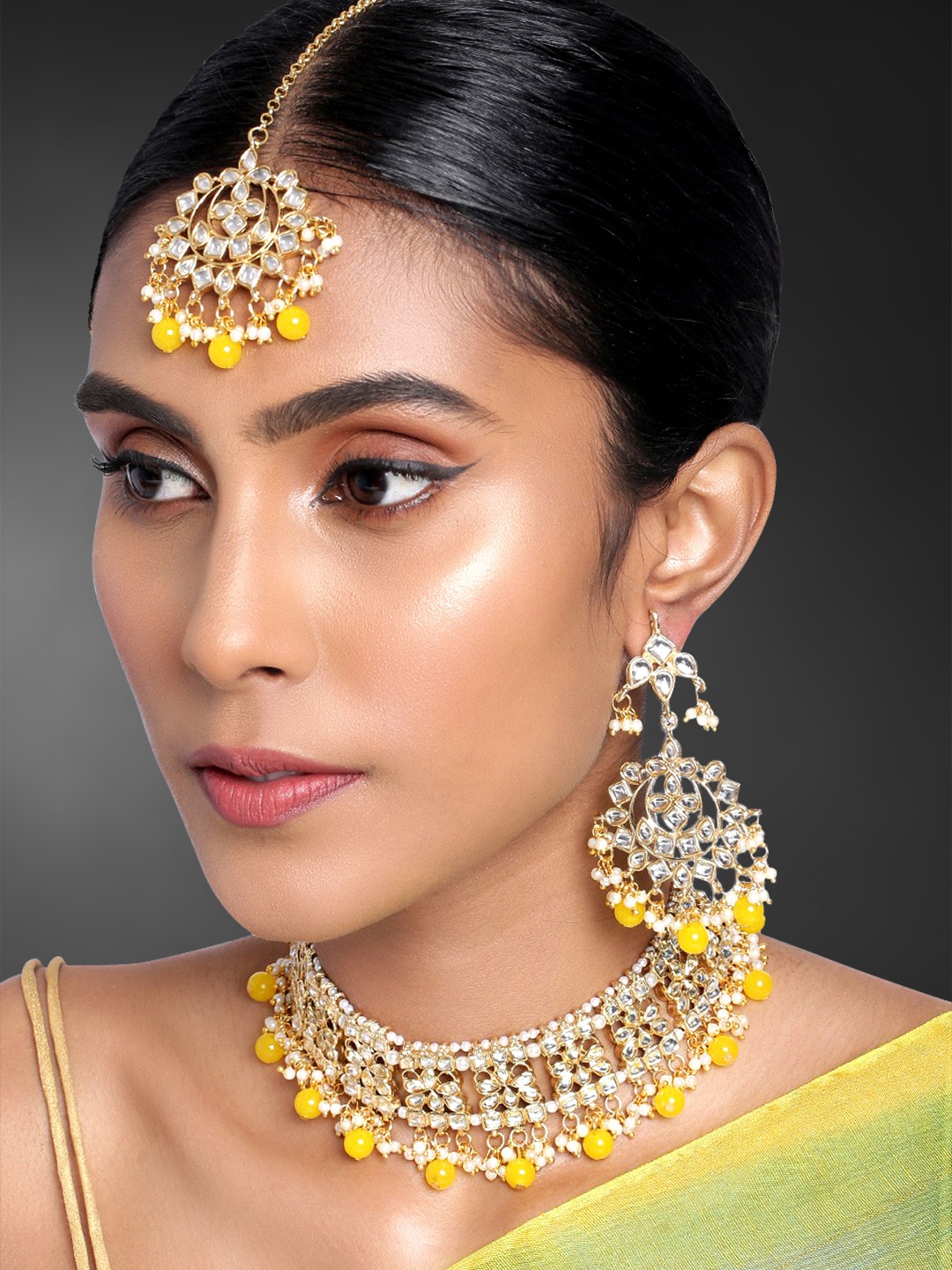 

Peora Gold-Plated Yellow Kundan Studded Jewellery Set