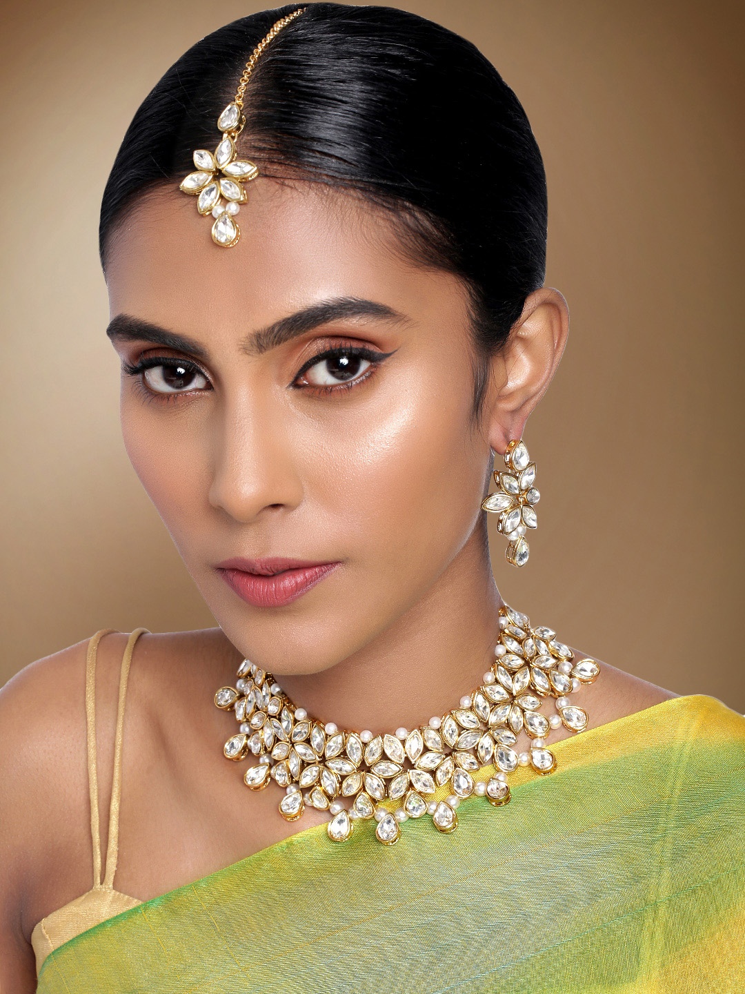 

Peora Gold-Plated White Crystal Studded Jewellery Set