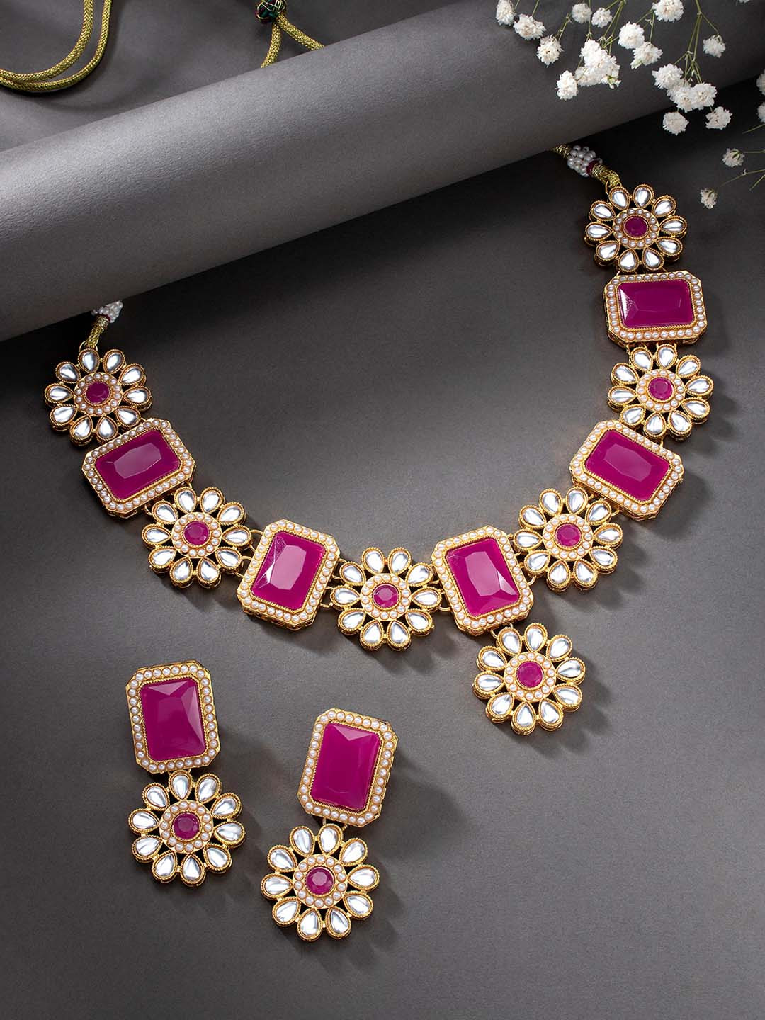 

Peora Gold Plated Magenta Kundan Studded Floral Shaped Handcrafted Jewellery Set