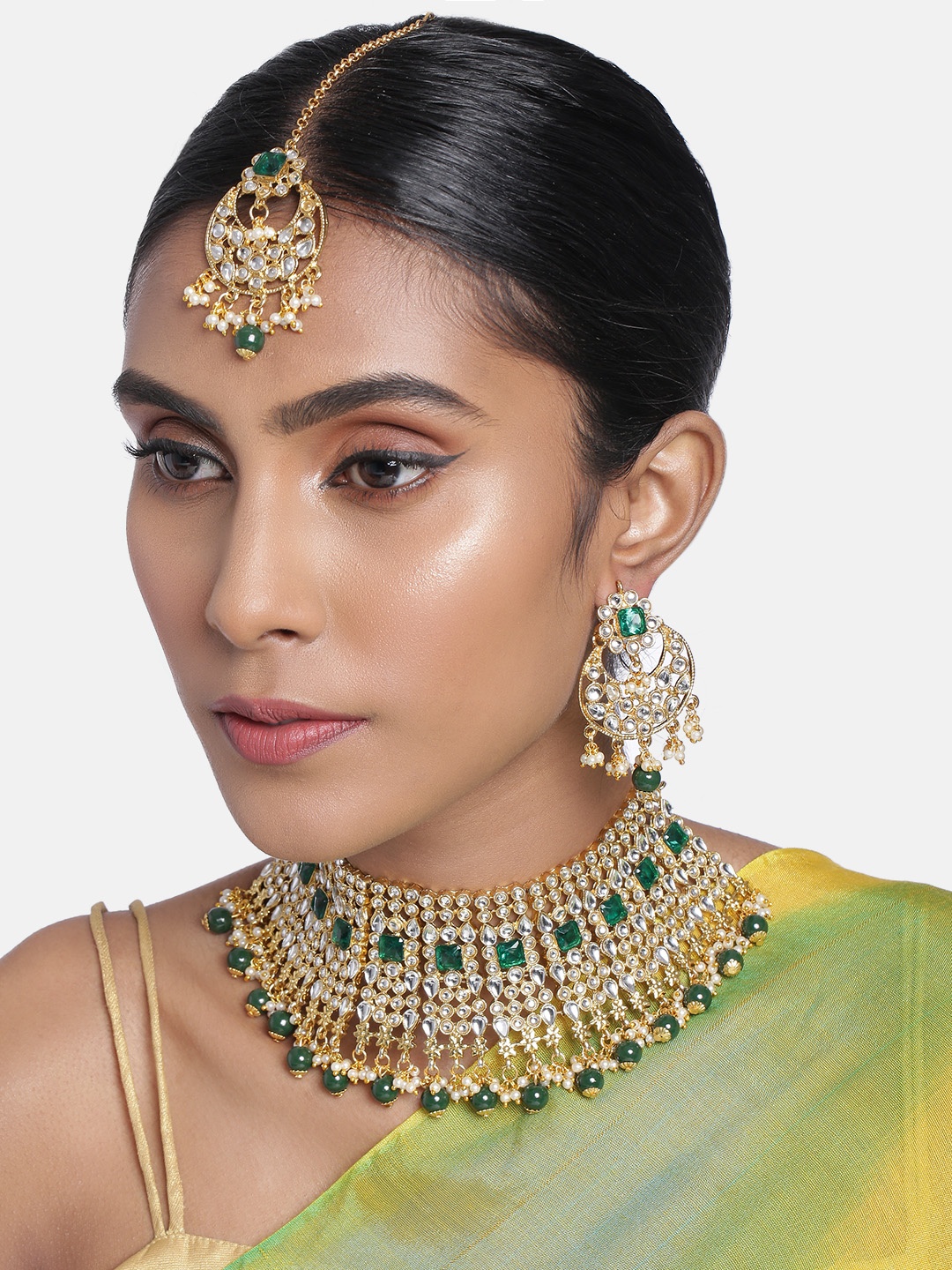

Peora Green & White Gold Plated Kundan and Pearl Studded Jewellery Set