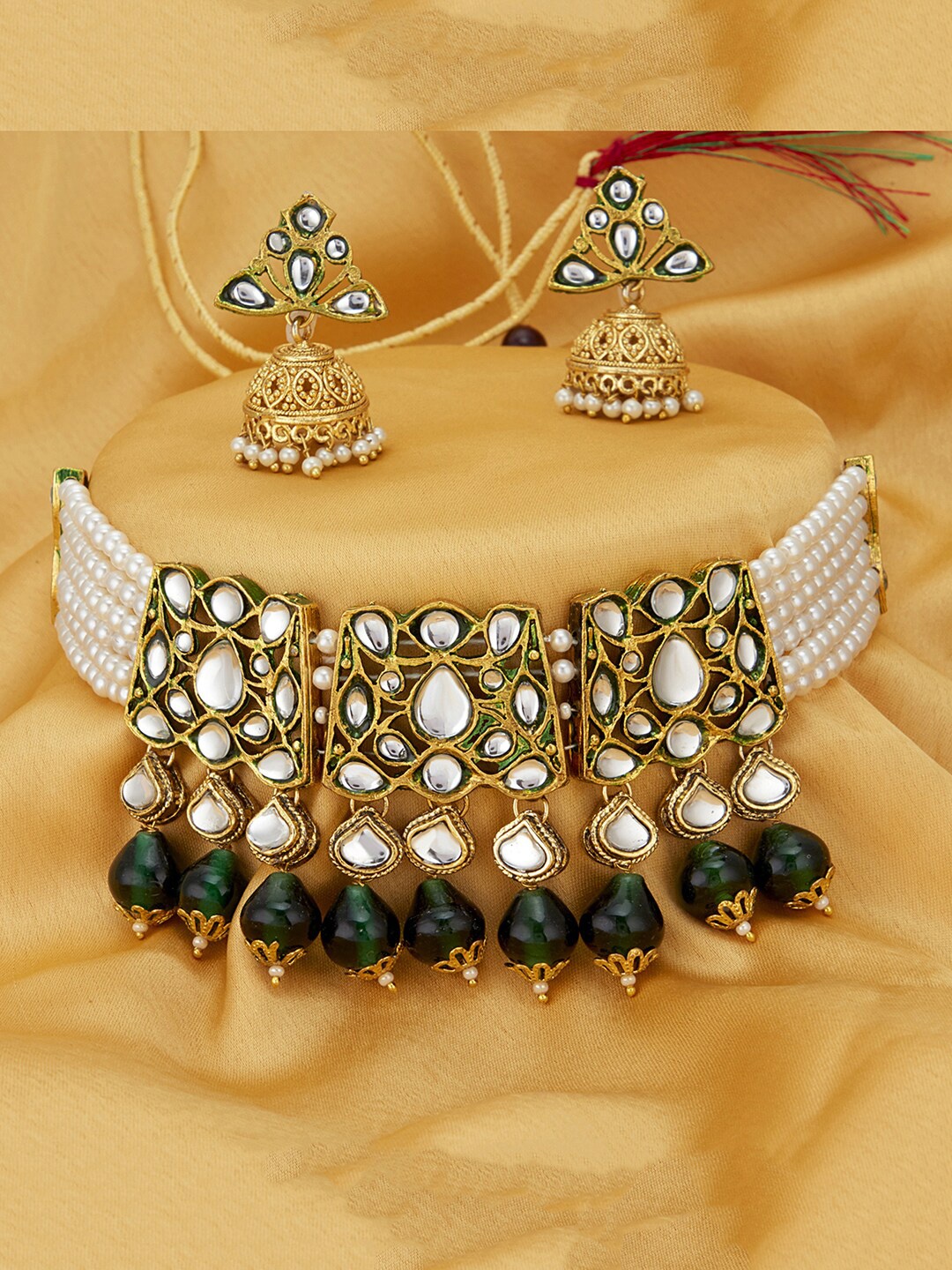 

Sukkhi Gold-Plated White Kundan-Studded & Green Pearl Beaded Jadau Jewellery Set