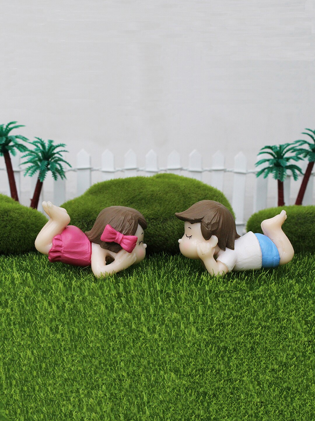 

Wonderland Beige & Pink Lying Boy & Girl For Tray Gardening Accessories