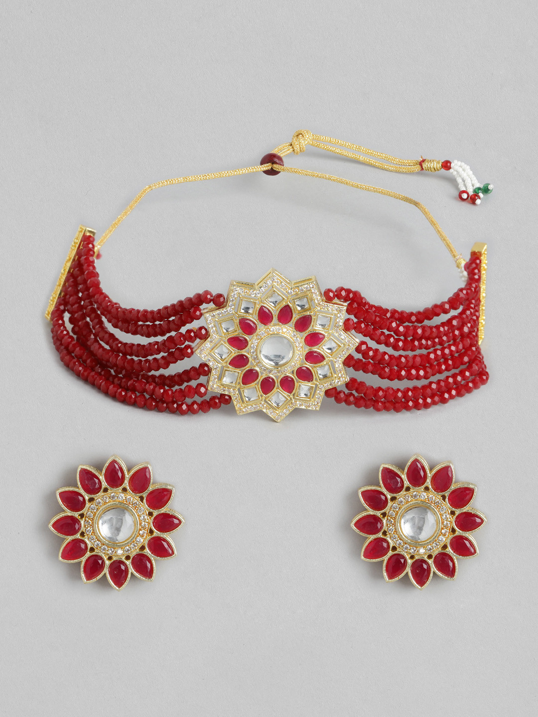 

Melani Borsa Maroon Gold-Plated Kundan Studded & Beaded Jewellery Set
