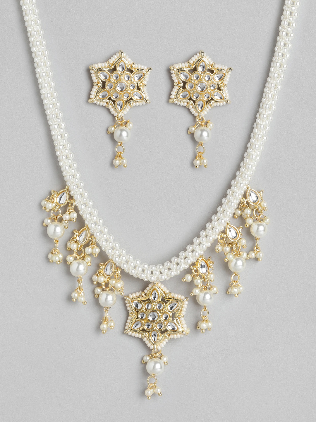 

Melani Borsa Off-White Gold-Plated Kundan Studded & Beaded Jewellery Set