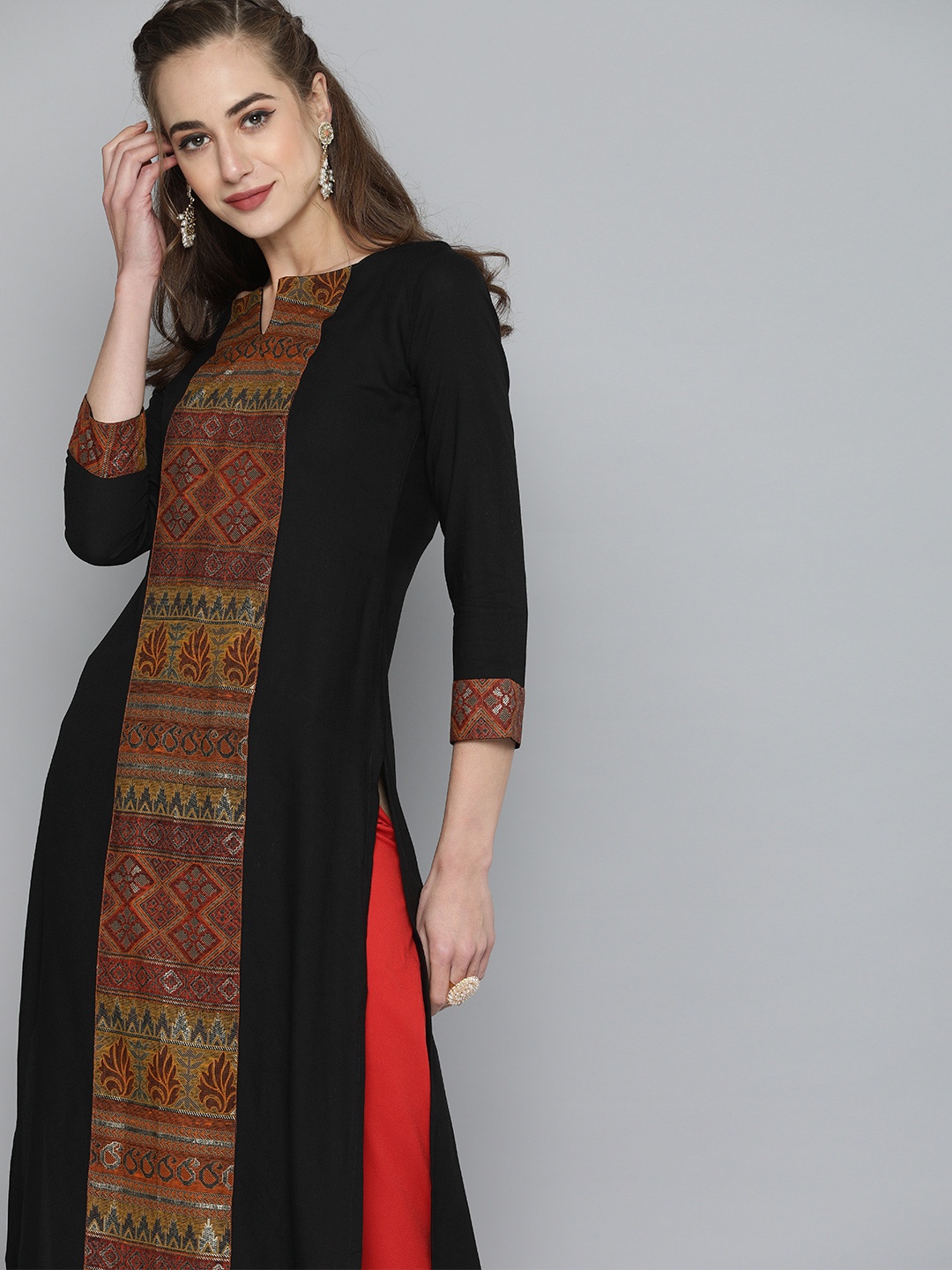 

Kvsfab Women Black & Orange Ethnic Motifs Printed Panelled Kurta