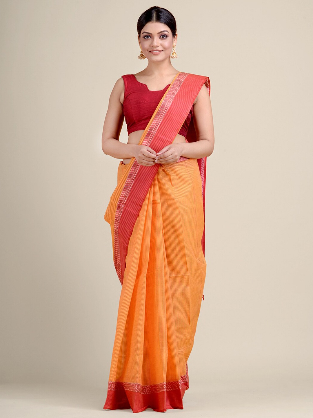 

Charukriti Orange & Red Striped Pure Cotton Taant Saree