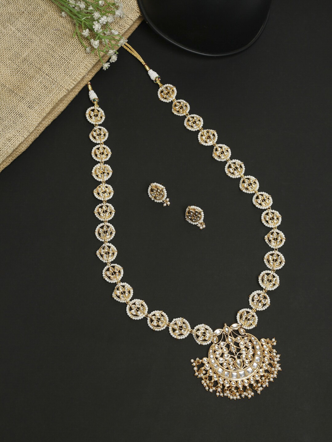 

Ruby Raang Gold-Toned & White Kundan-Studded & Pearl Beaded Meenakari Jewellery Set