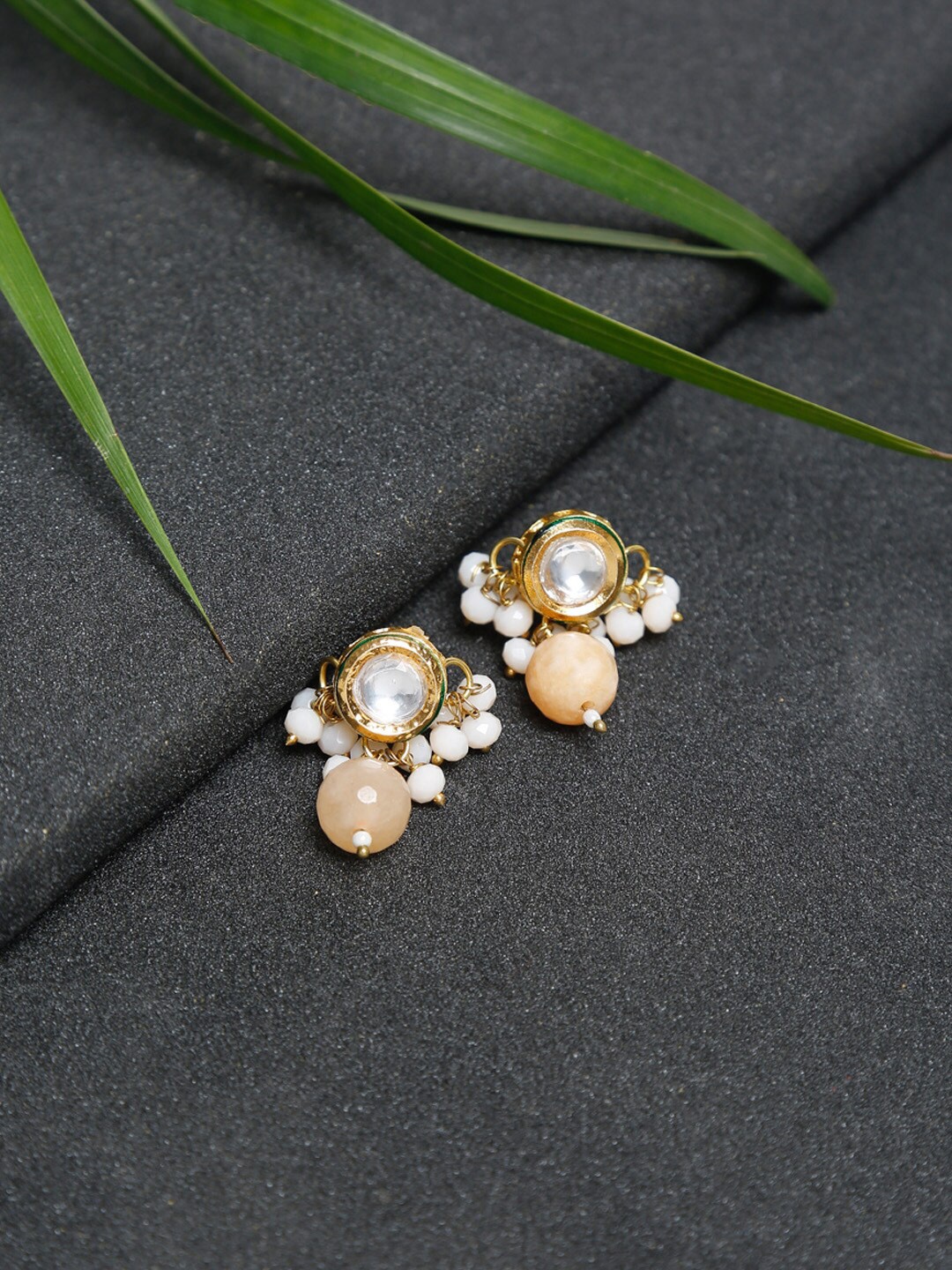 

Ruby Raang Gold-Toned & Peach Pearl & Kundan Studded Contemporary Studs Earrings