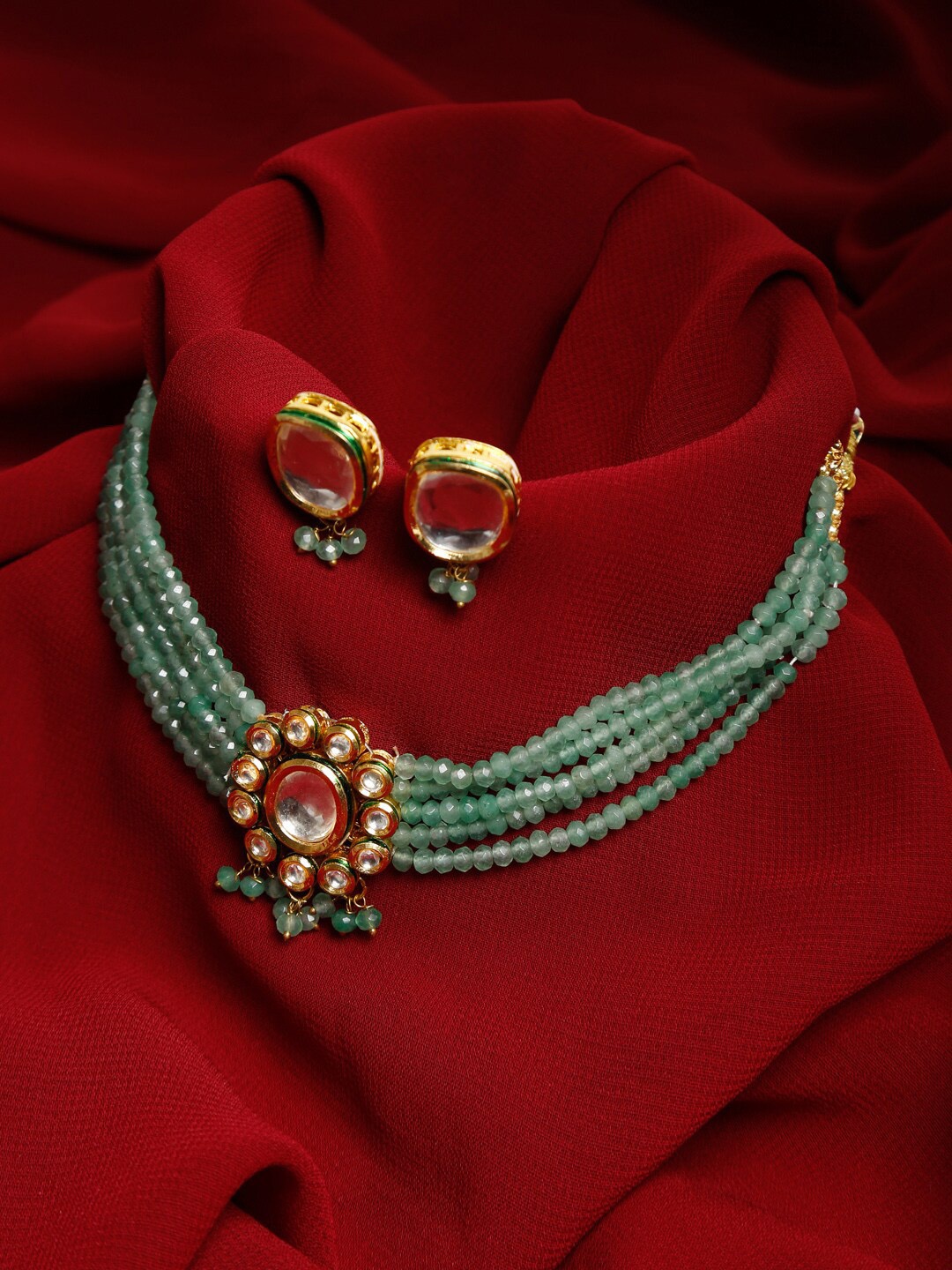 

Ruby Raang Gold-Toned & White Faux Kundan-Studded & Faux Pearl Beaded Meenakari Jewellery Set