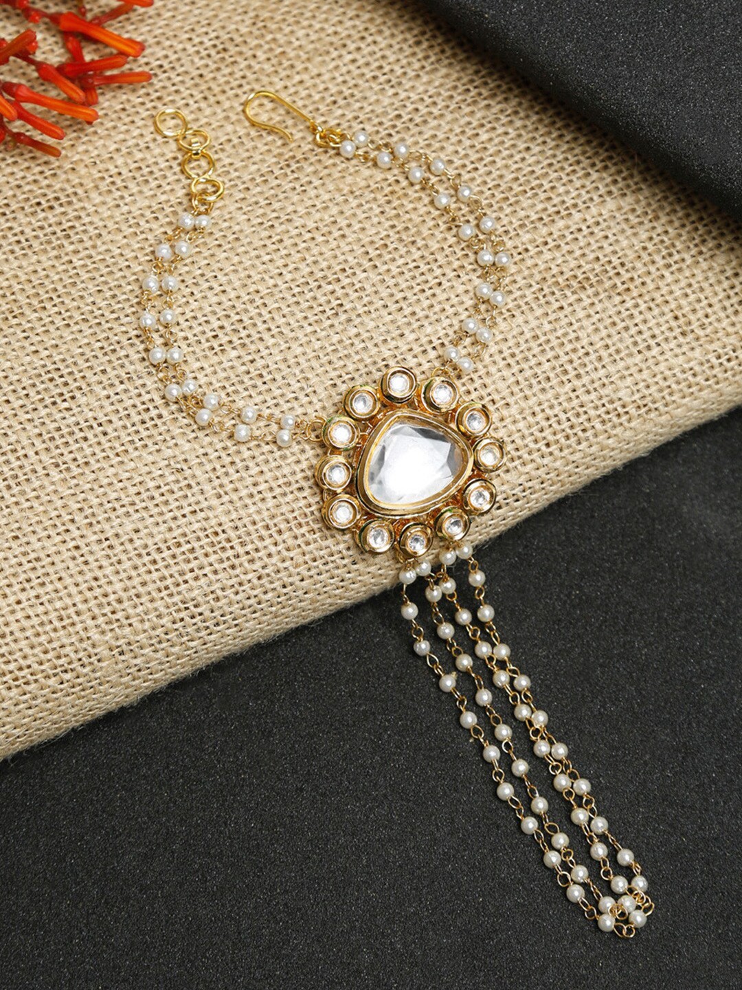 

Ruby Raang Women Gold-Toned & White Kundan Ring Bracelet