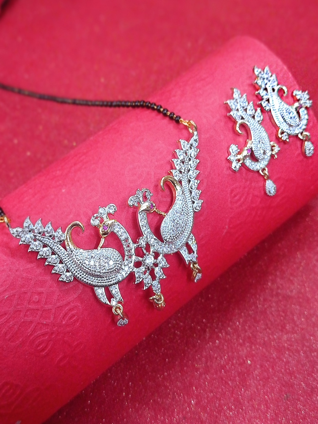 

OOMPH Silver Tone American Diamond Peacock Design Mangalsutra Set