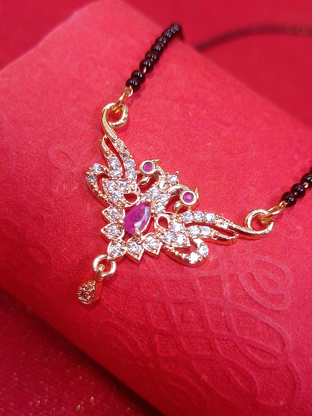 

OOMPH Rose Gold Toned Red American Diamond Floral Mangalsutra