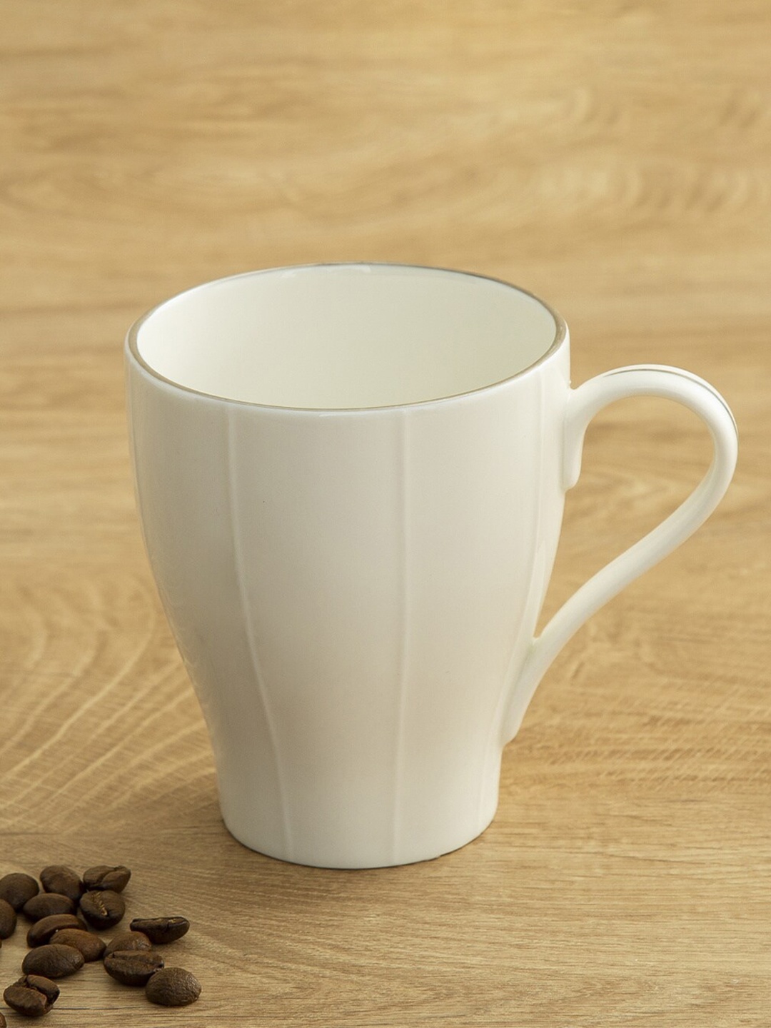 

Home Centre White Solid Ceramic Glossy Mug