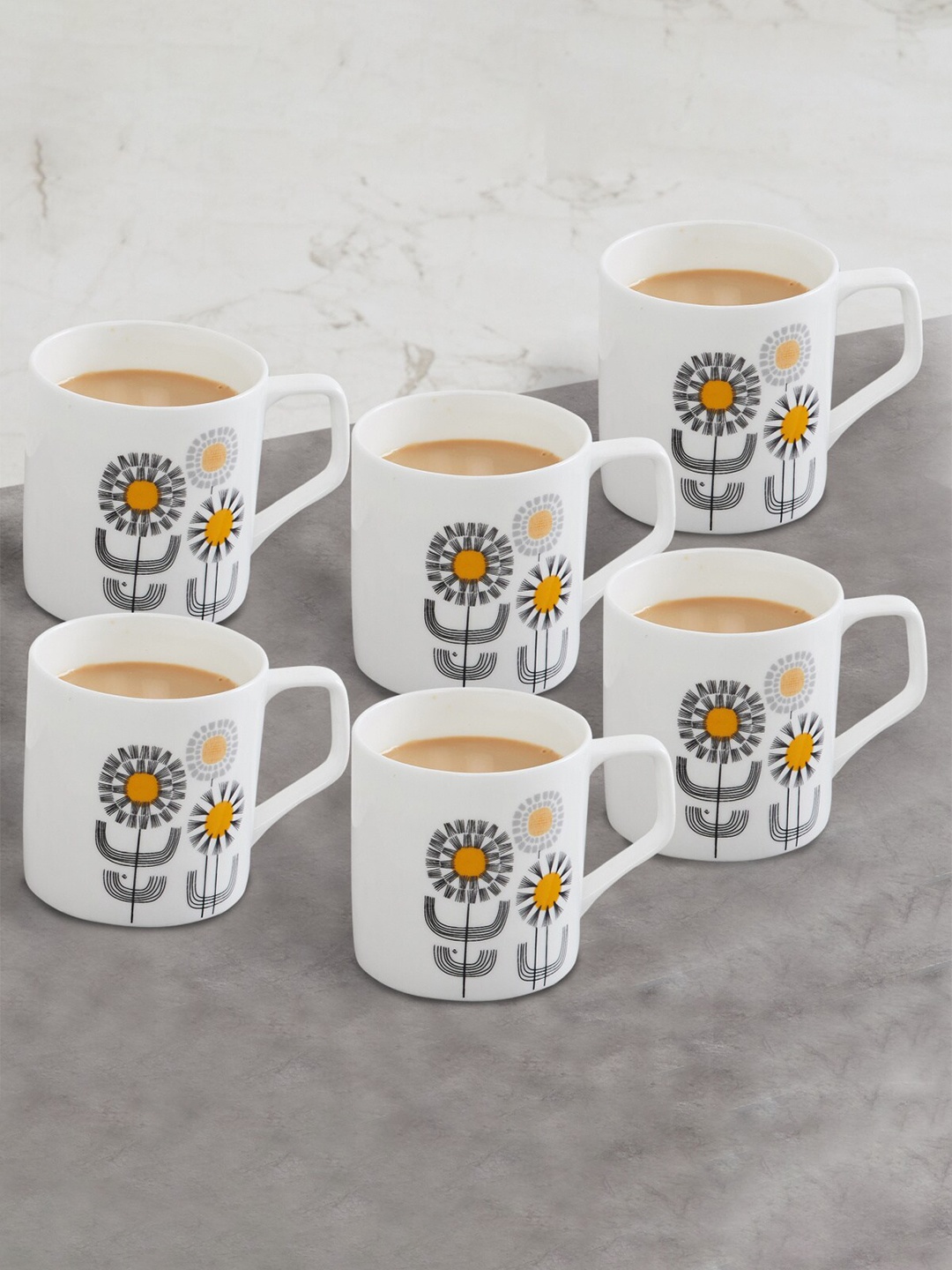 

Home Centre White & Yellow Printed 6-Pieces Bone China Glossy Mugs Set