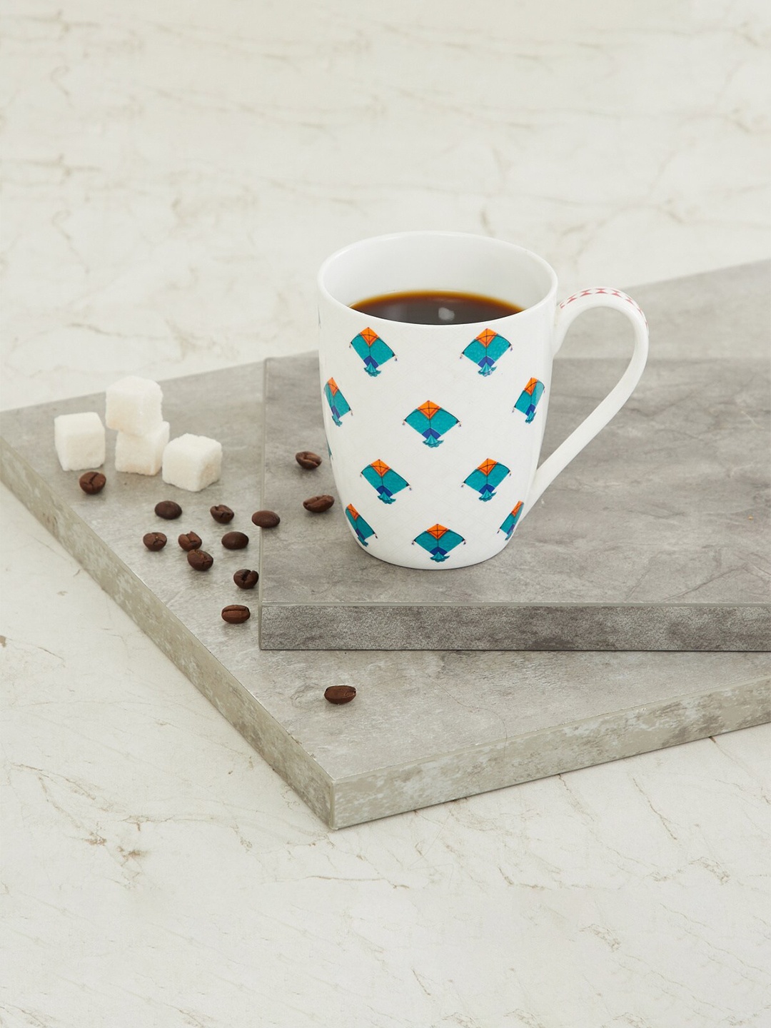 

Home Centre White & Red Printed Bone China Glossy Mugs