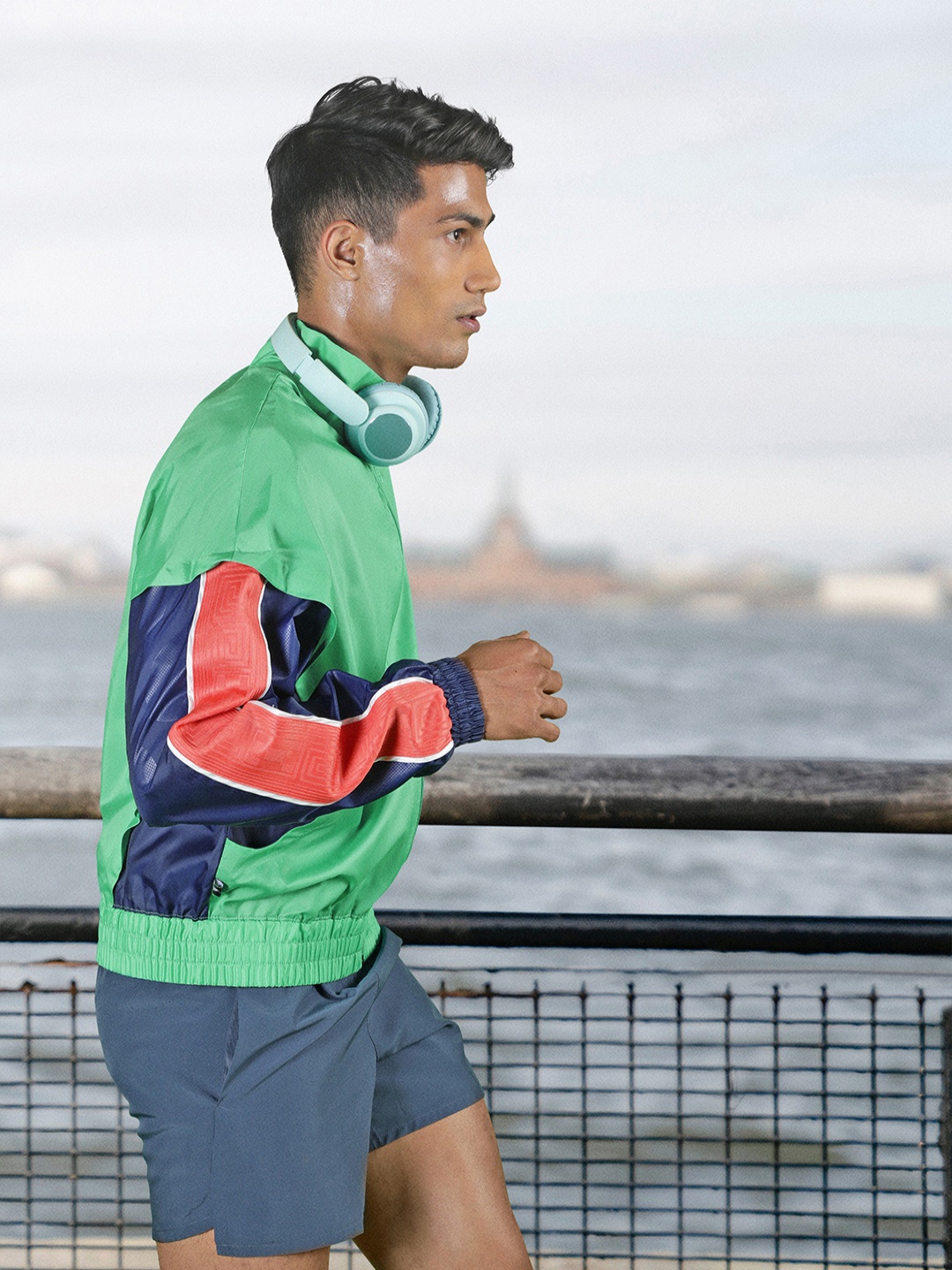 

Nike Men Green Blue Colourblocked Lightweight Track Jacket