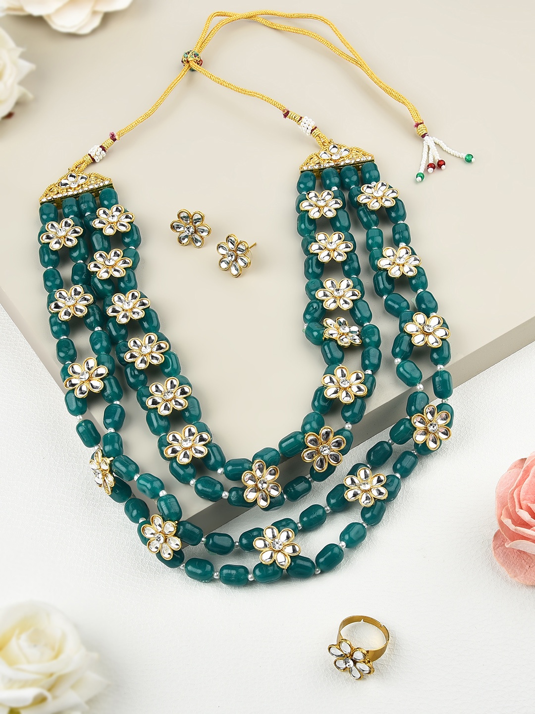 

Zaveri Pearls Gold-Plated White & Green Stone-Studded & Beaded Jewellery Set