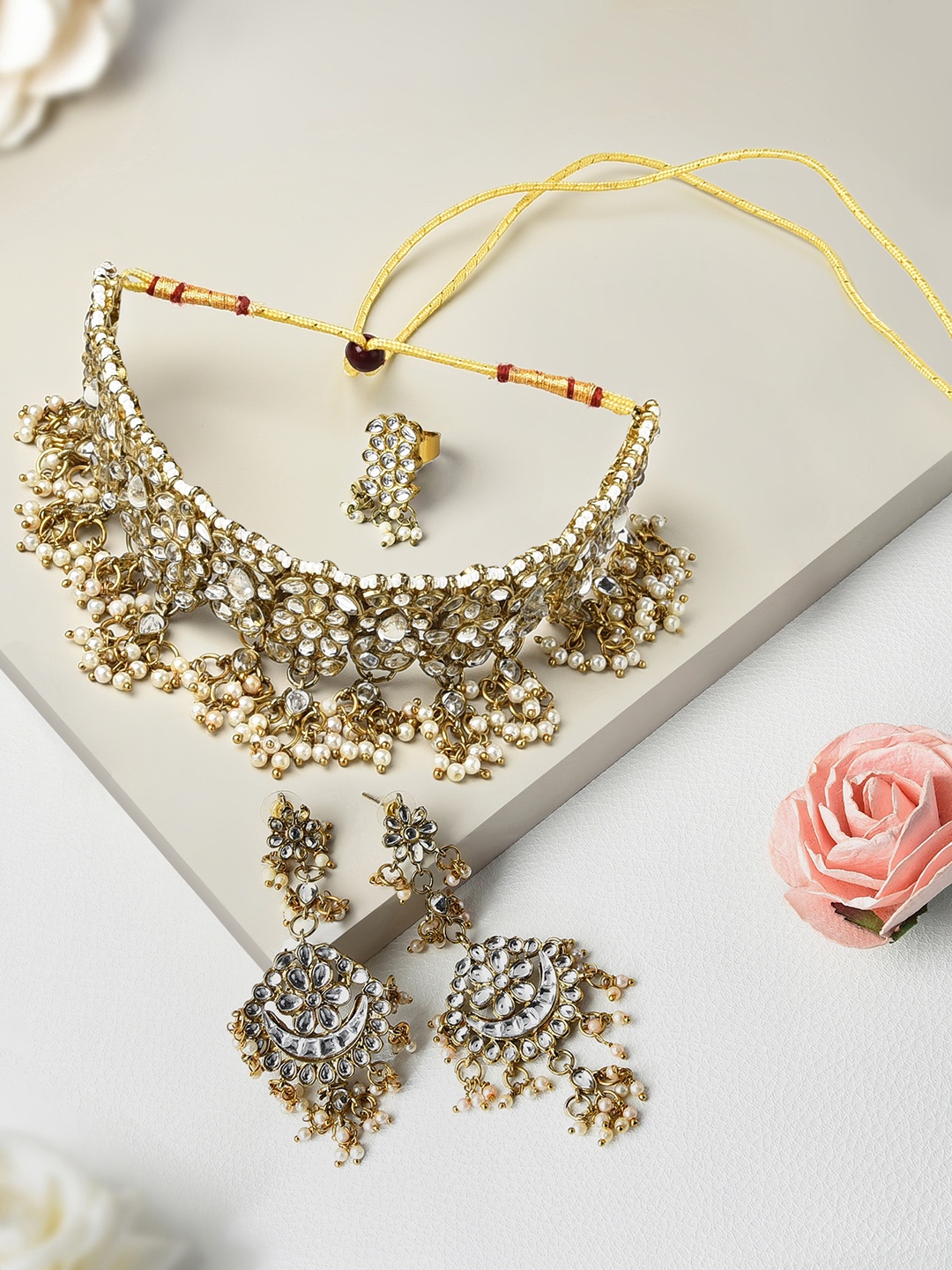 

Zaveri Pearls Gold-Plated White Kundan-Studded & Beaded Antique Jewellery Set