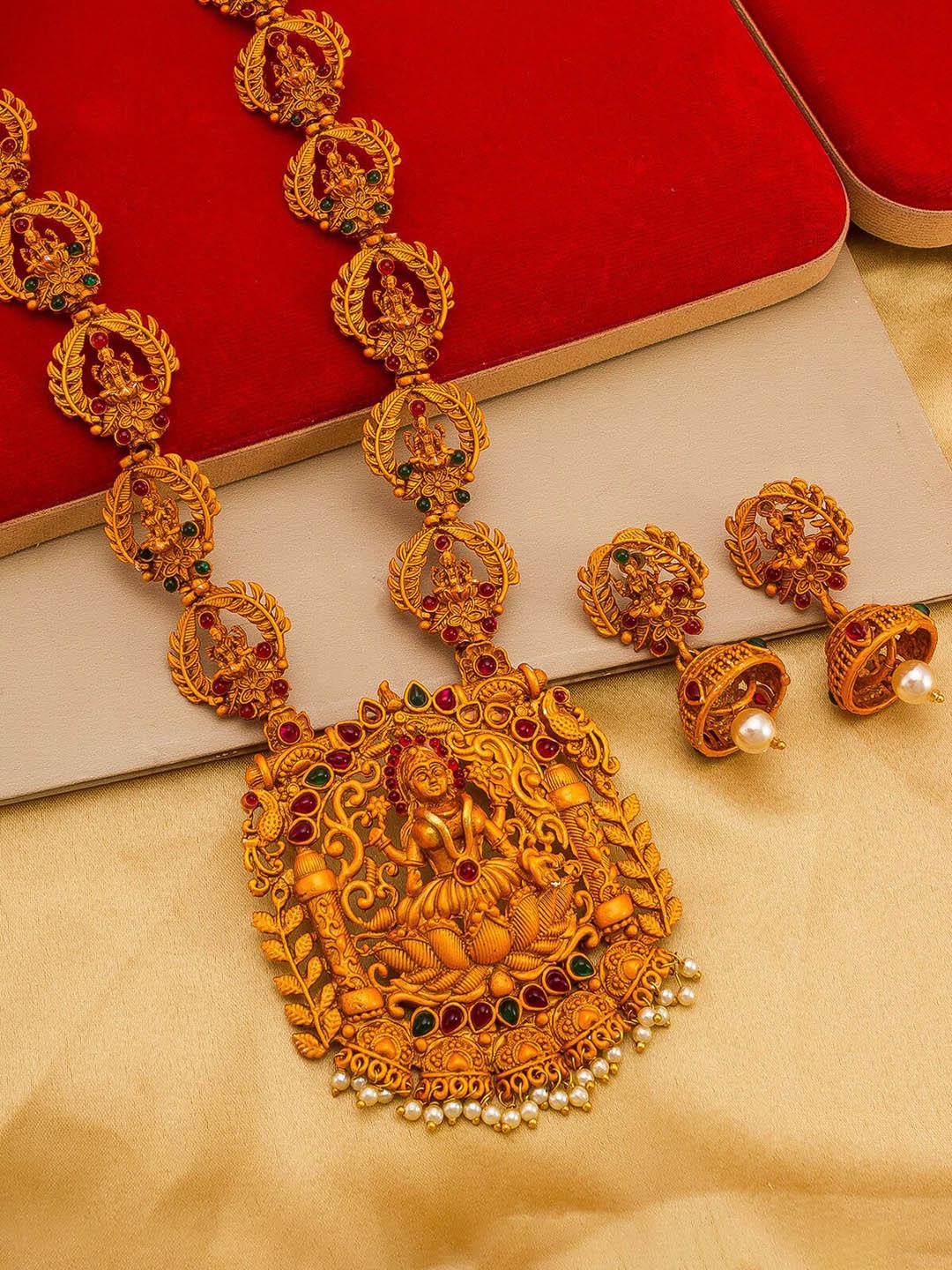 

aadita Gold-Plated Red & Green Pearl Beaded & Stone-Studded Temple Jewellery Set