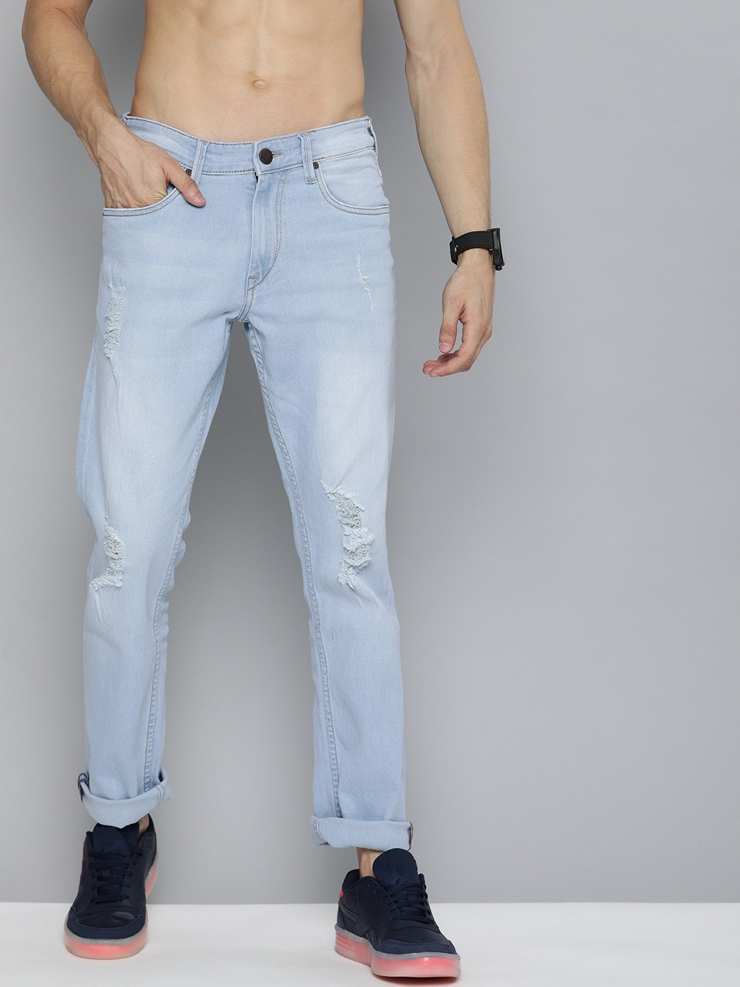 

HERE&NOW Men Blue Mildly Distressed Light Fade Slim Fit Stretchable Jeans