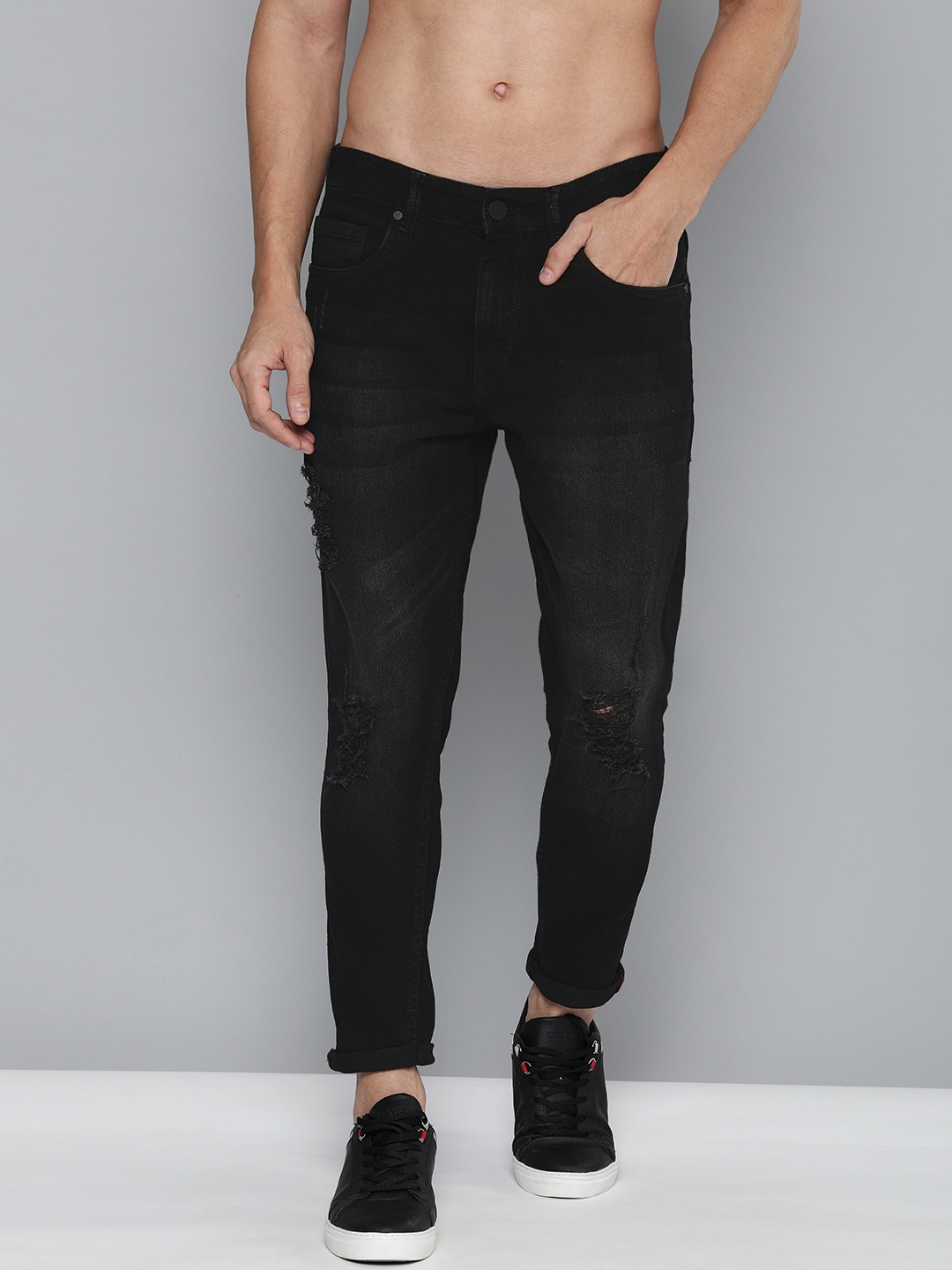 

HERE&NOW Men Black Tapered Fit Mid-Rise Mildly Distressed Light Fade Stretchable Jeans