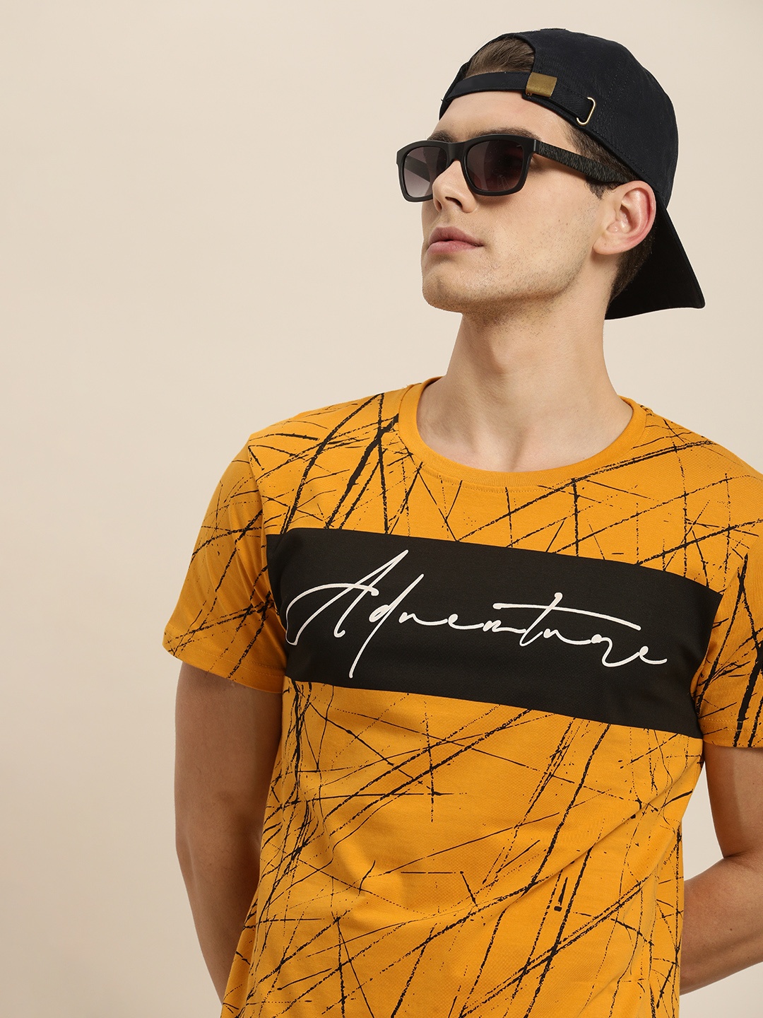 

Moda Rapido Men Mustard Yellow Black Printed Pure Cotton T-shirt
