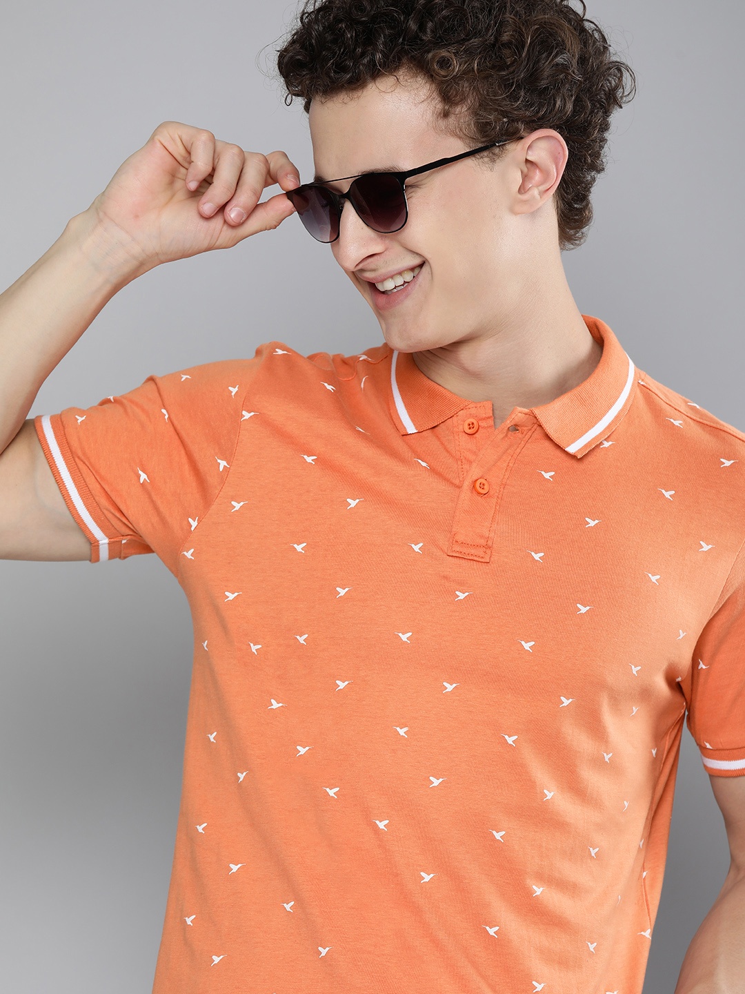 

HERENOW Men Coral Orange White Printed Polo Collar Pure Cotton T-shirt