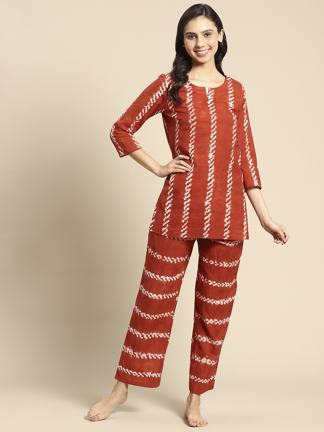 

Prakrti Women Orange & White Hand Tie & Dye Printed Pure Cotton Night suit