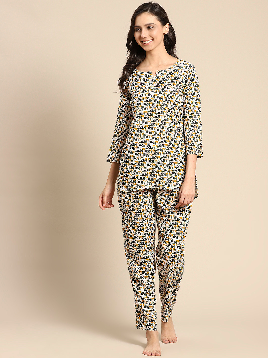 

Prakrti Women White & Mustard Yellow Typographic Print Pyjama Set