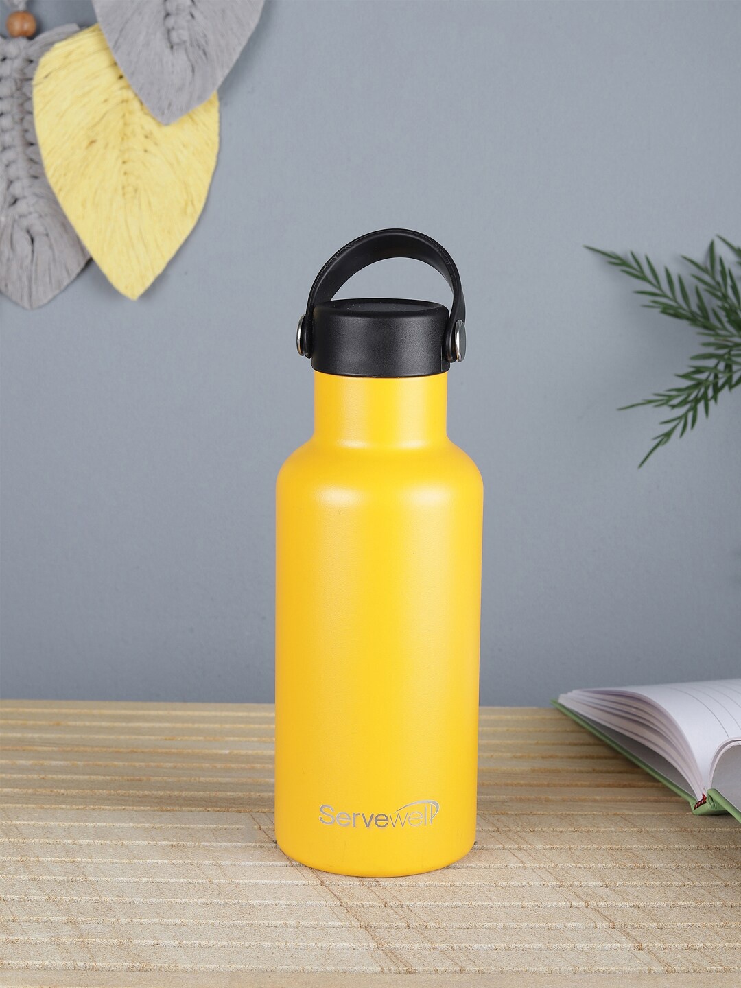 

Servewell Yellow & Black Solid Stainless Steel Vacuum Water Bottle 500 ml