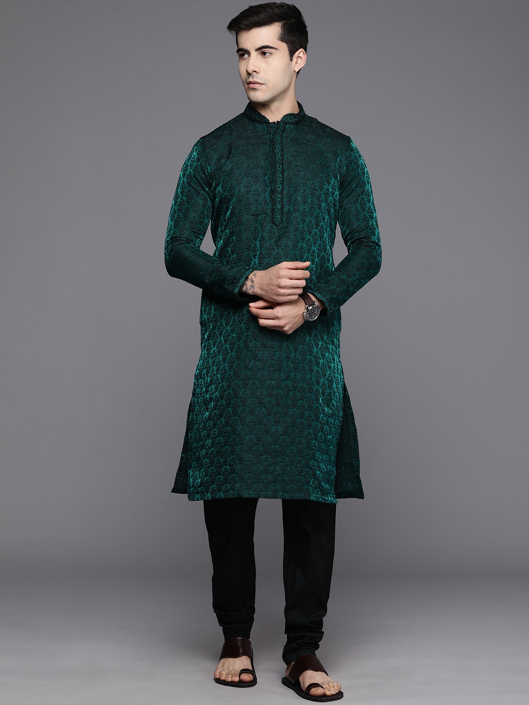 

Manyavar Men Green & Black Ethnic Motifs Jacquard Embroidered Kurta with Churidar