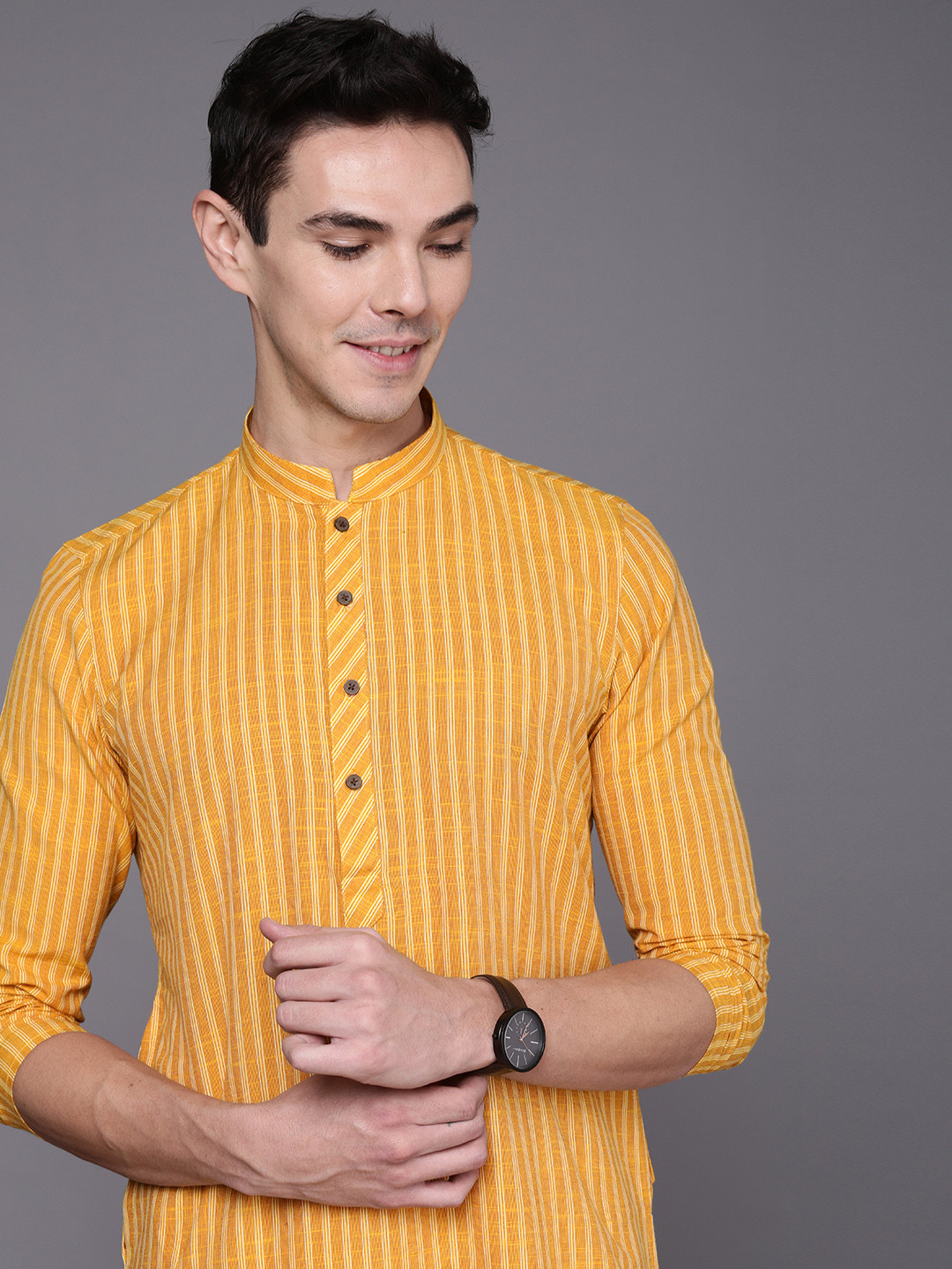 

Manyavar Men Yellow Striped Kurta