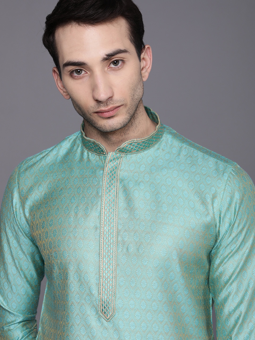 

Manyavar Men Turquoise Blue Ethnic Motifs Regular Kurta with Pyjamas