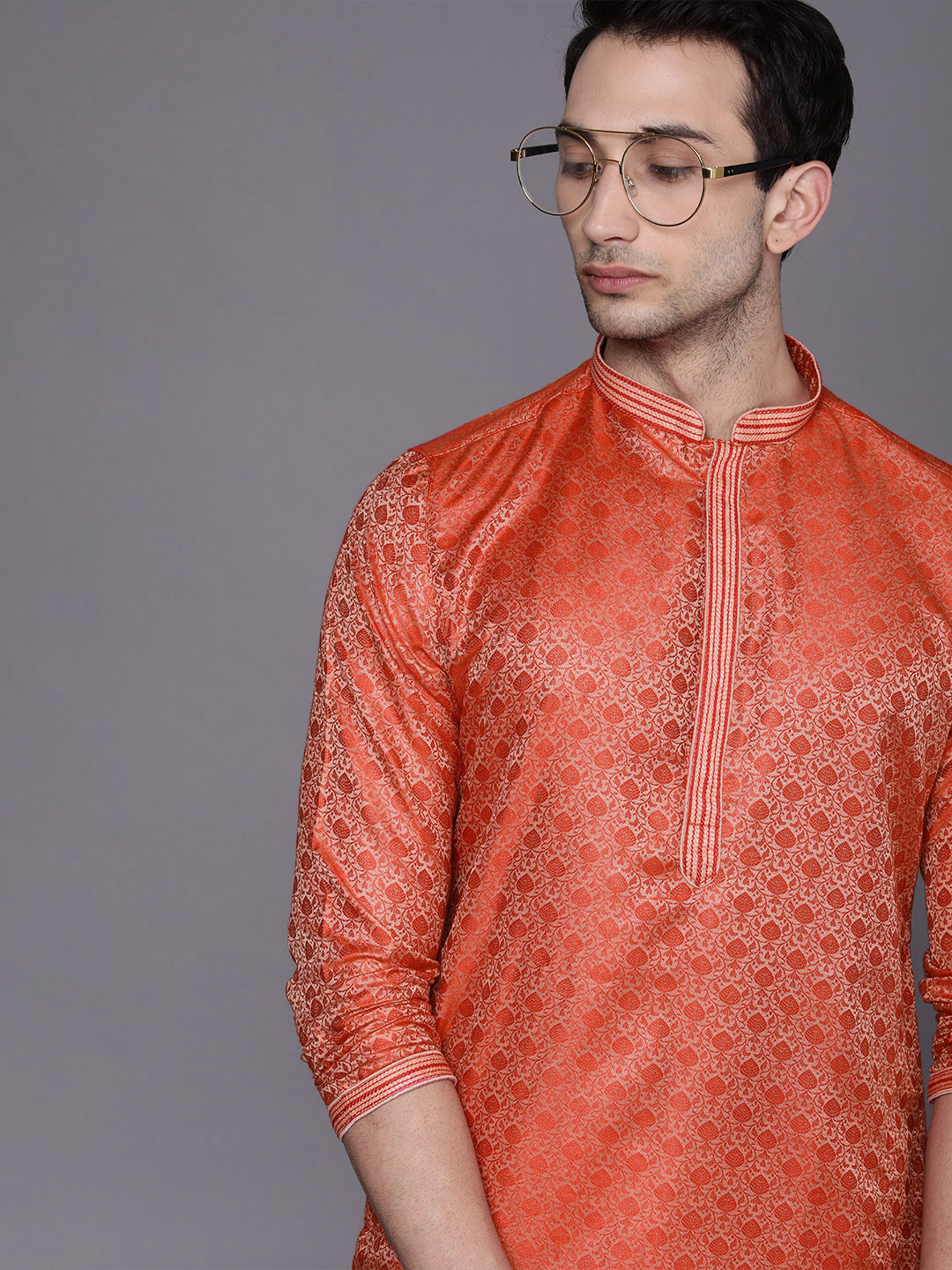 

Manyavar Men Peach-Coloured Ethnic Motifs Regular Kurta with Churidar