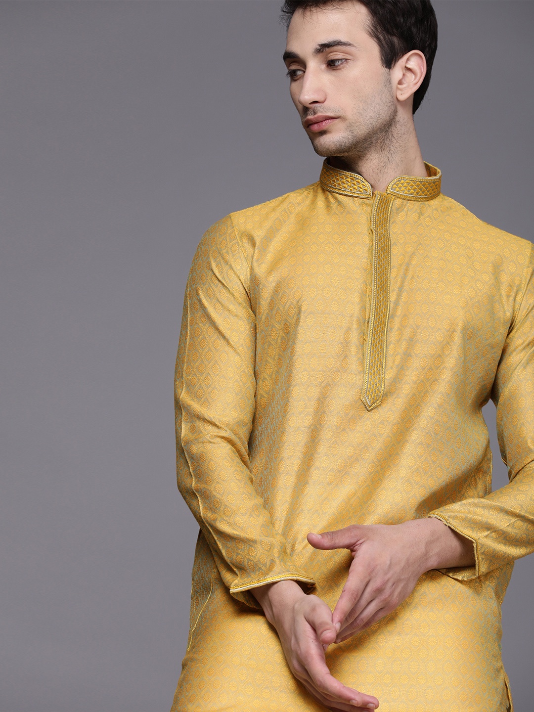 

Manyavar Men Yellow Floral Regular Kurta with Churidar