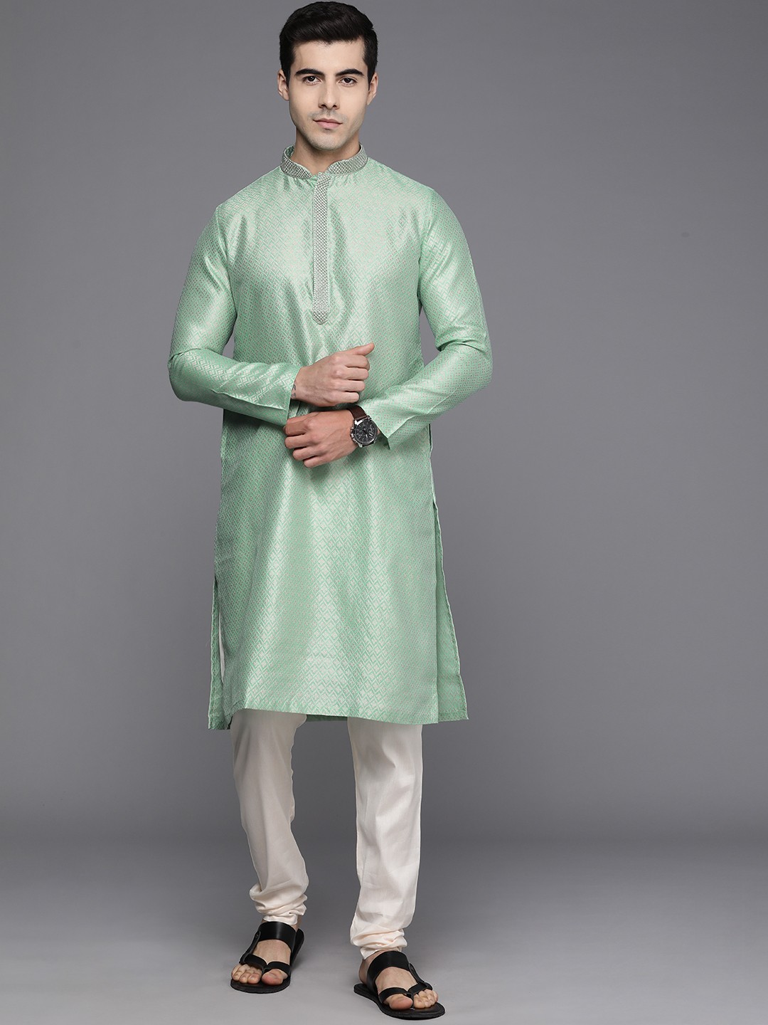 

Manyavar Men Green & White Ethnic Motifs Embroidered Kurta with Churidar