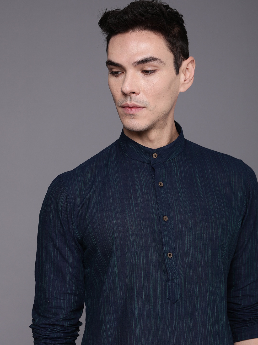 

Manyavar Men Navy Blue Striped Kurta