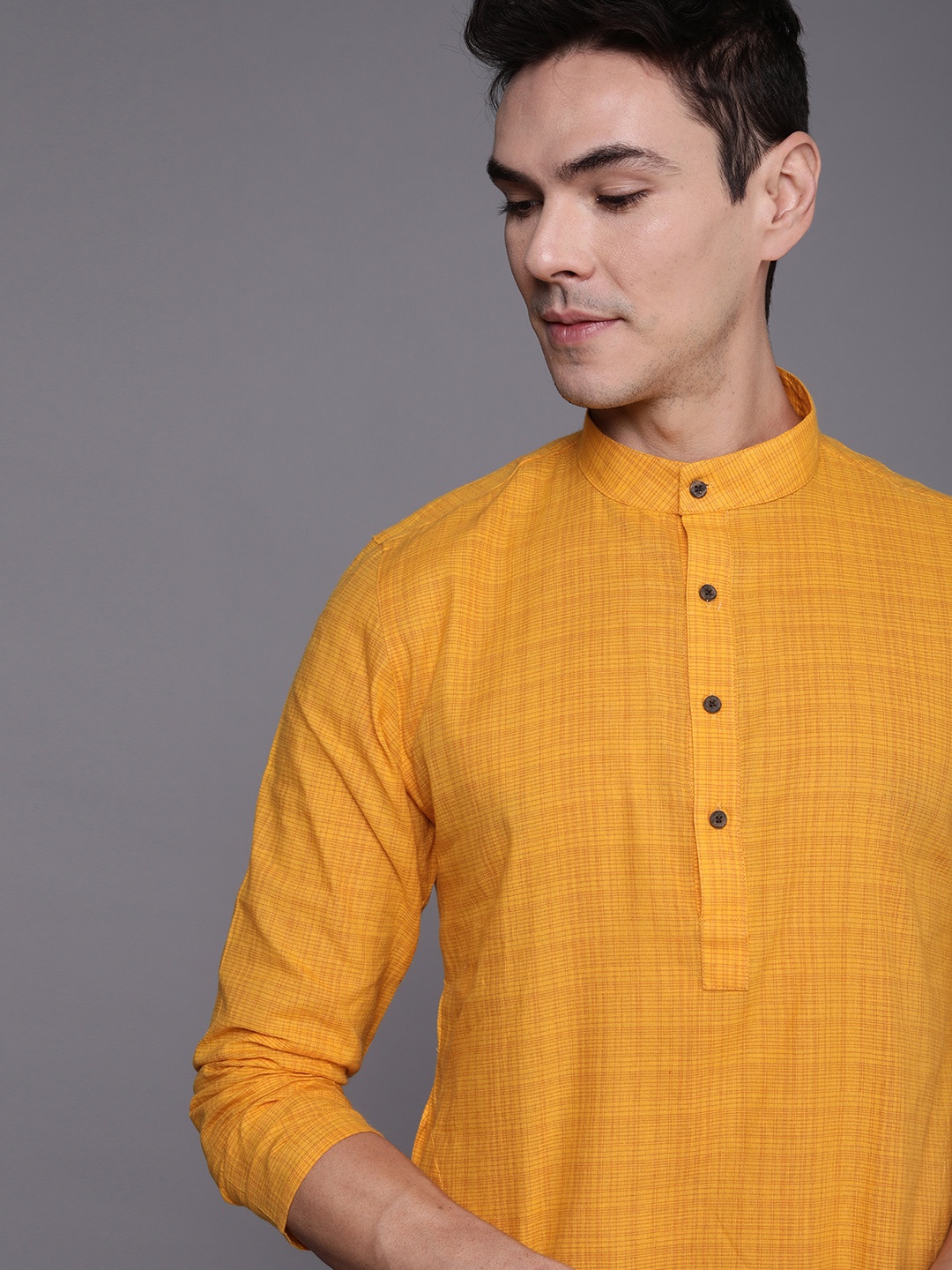 

Manyavar Men Yellow Checked Kurta