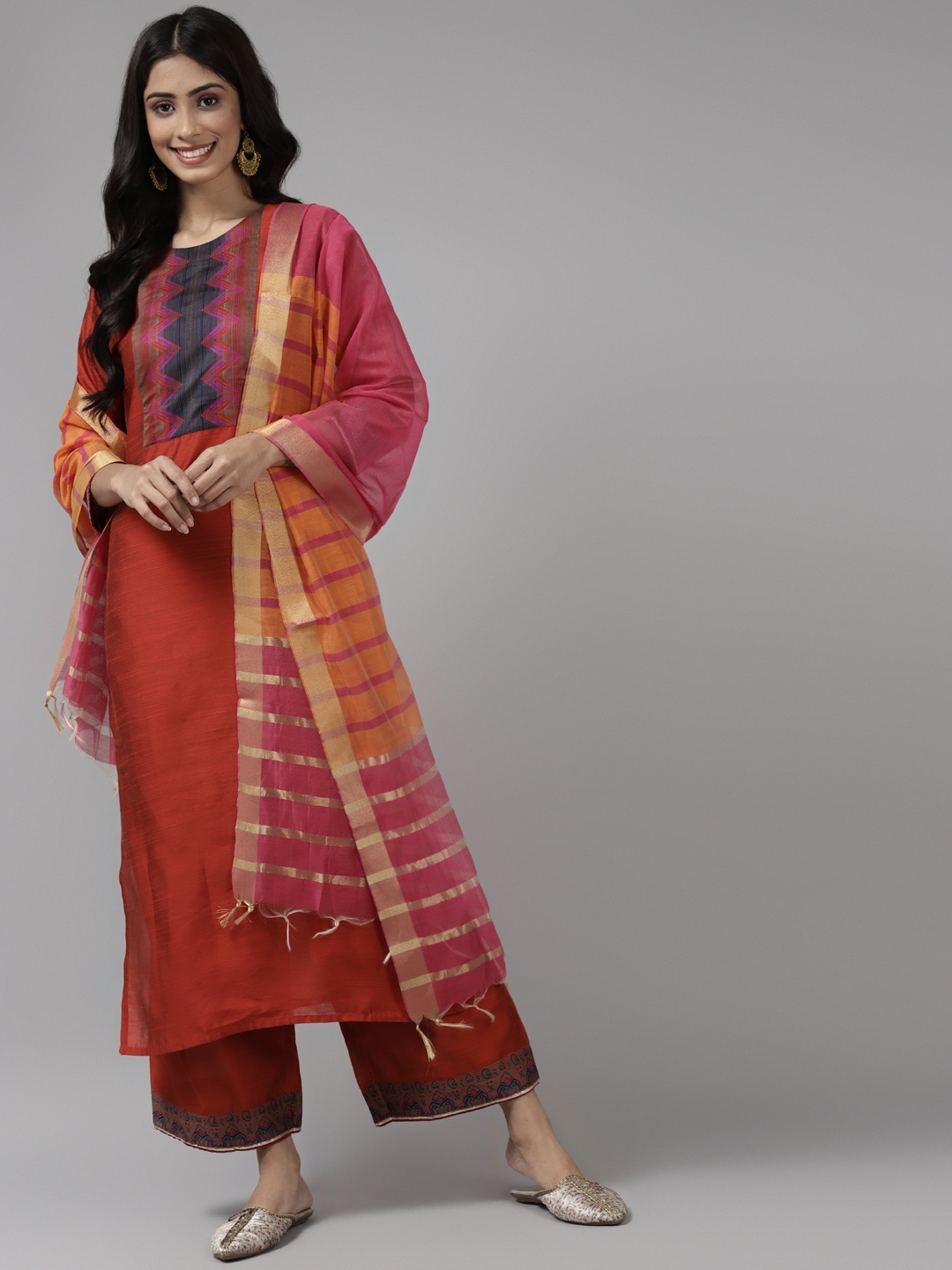 

Indo Era Women Orange Yoke Design Kurta with Palazzos & Dupatta